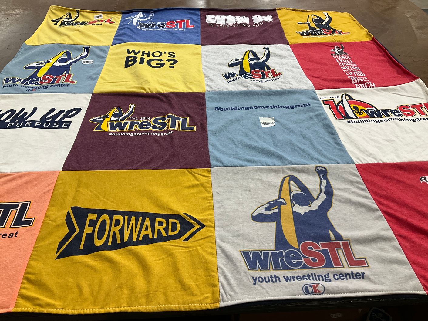 T-shirt quilt with wrestling, youth sports themes by Sara from MO