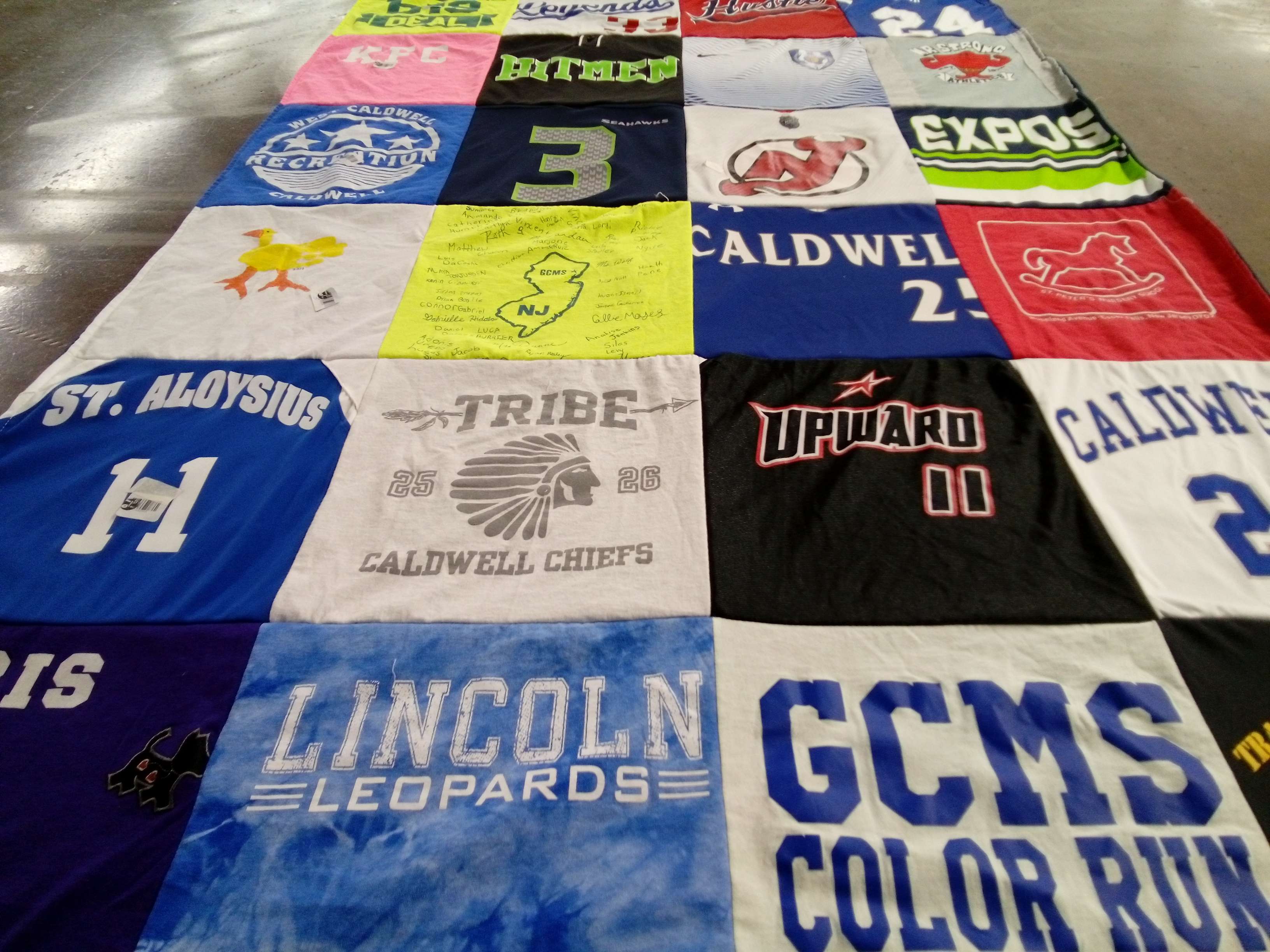 T-shirt quilt featuring caldwell chiefs, lincoln leopards by Erica from NJ