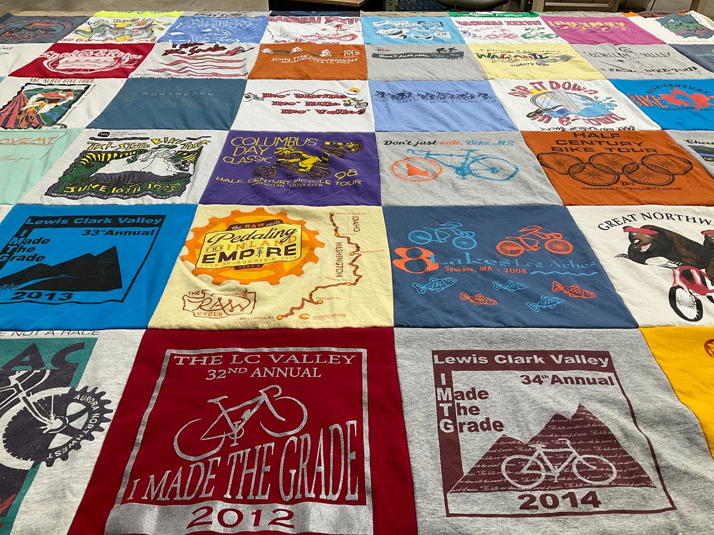 T-shirt quilt with cycling, biking themes by Linda from WA