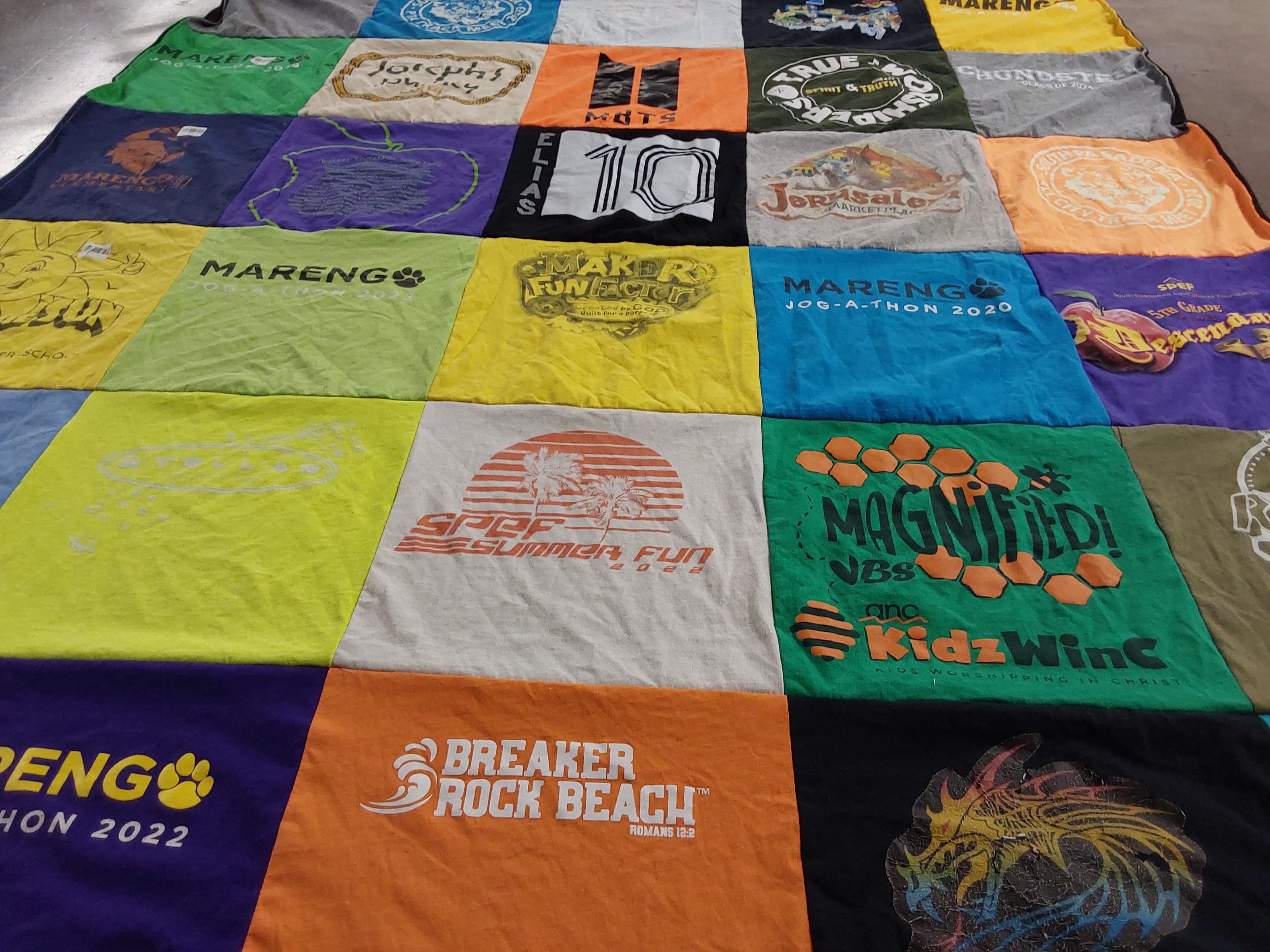 T-shirt quilt with youth activities, summer camps themes by Evet from CA