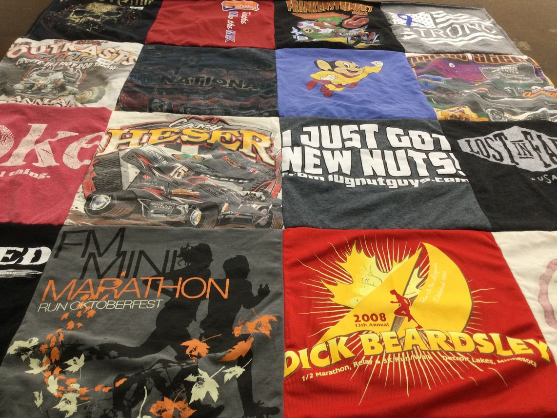 T-shirt quilt with running, sports themes by Cheri from WI