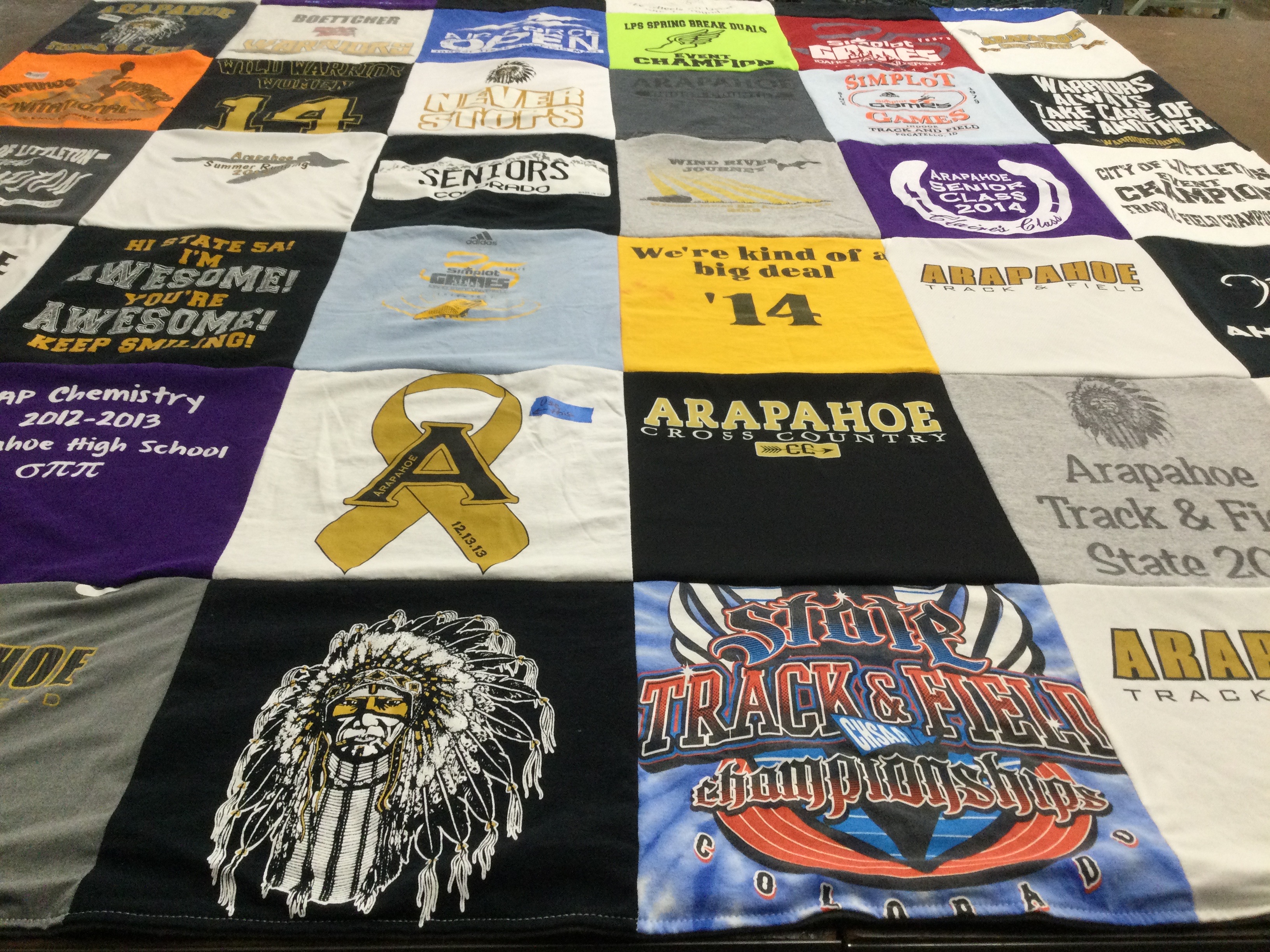 T-shirt quilt featuring arapahoe track and field, arapahoe cross country by Alyssa from WY