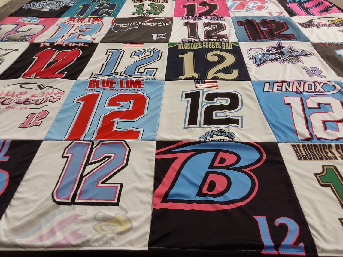 T-shirt quilt with sports, bar themes by Melissa from MN