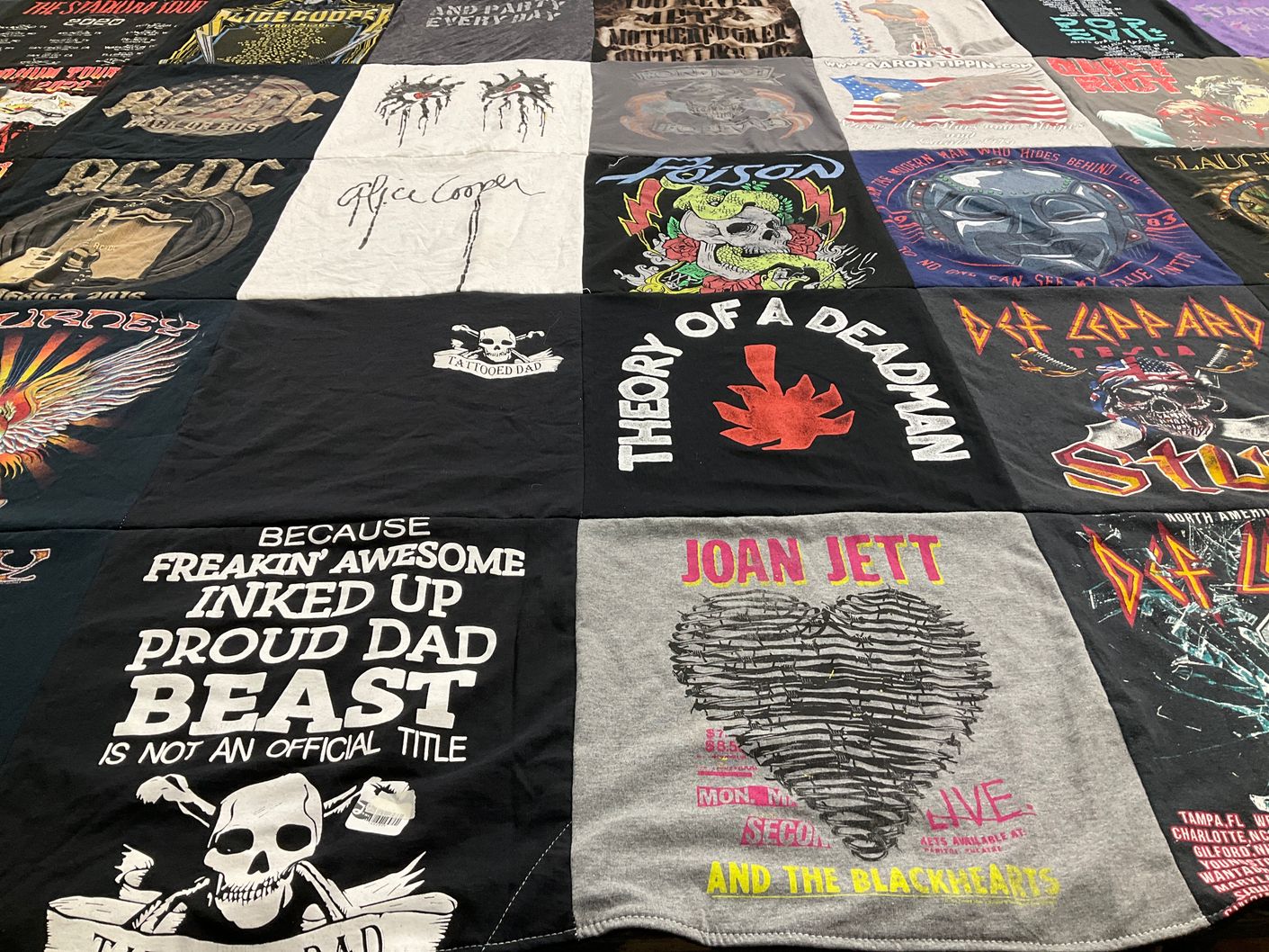 T-shirt quilt with music, rock themes by Mary from KS