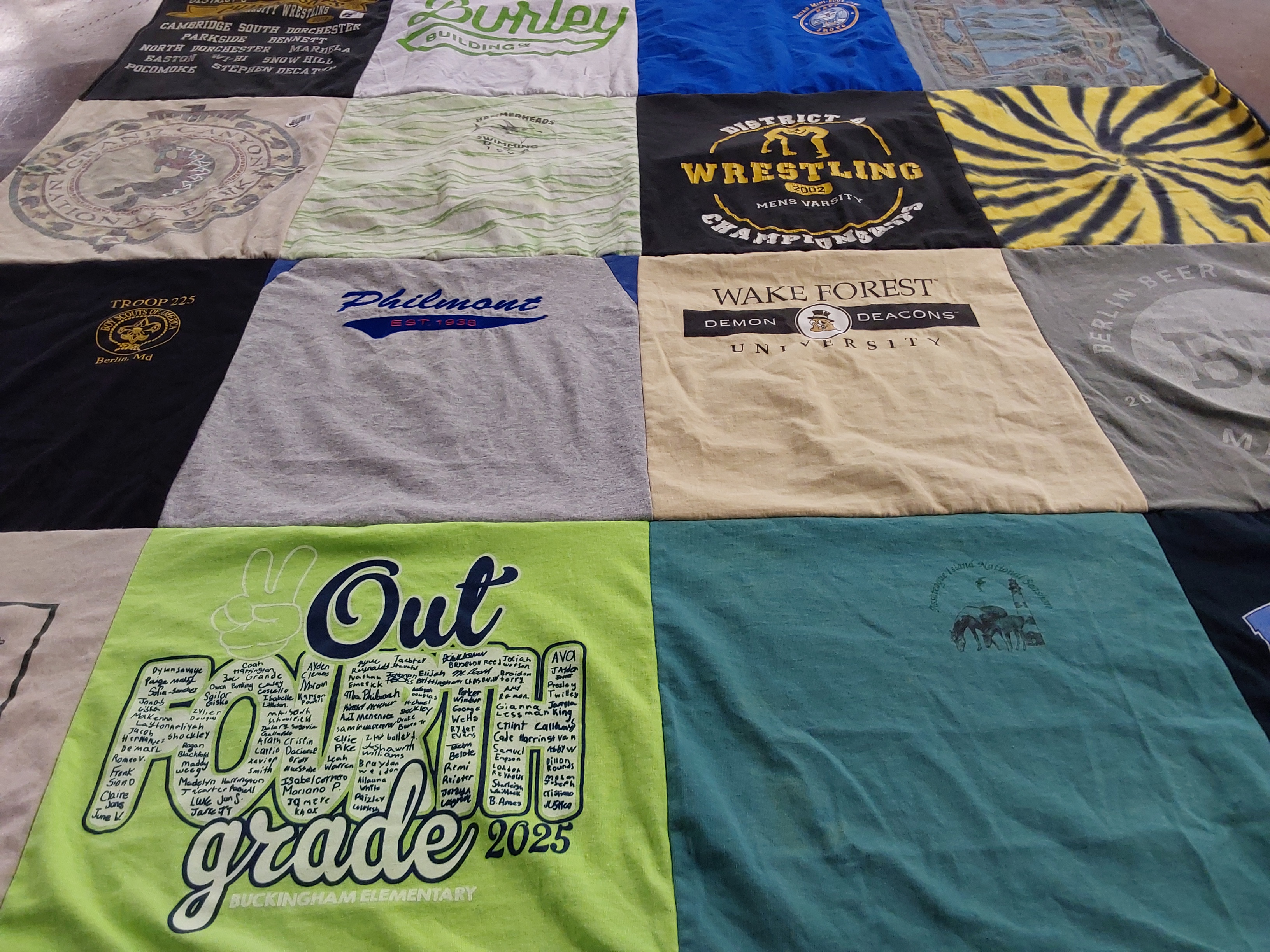 T-shirt quilt featuring district wrestling by Peggy from MD