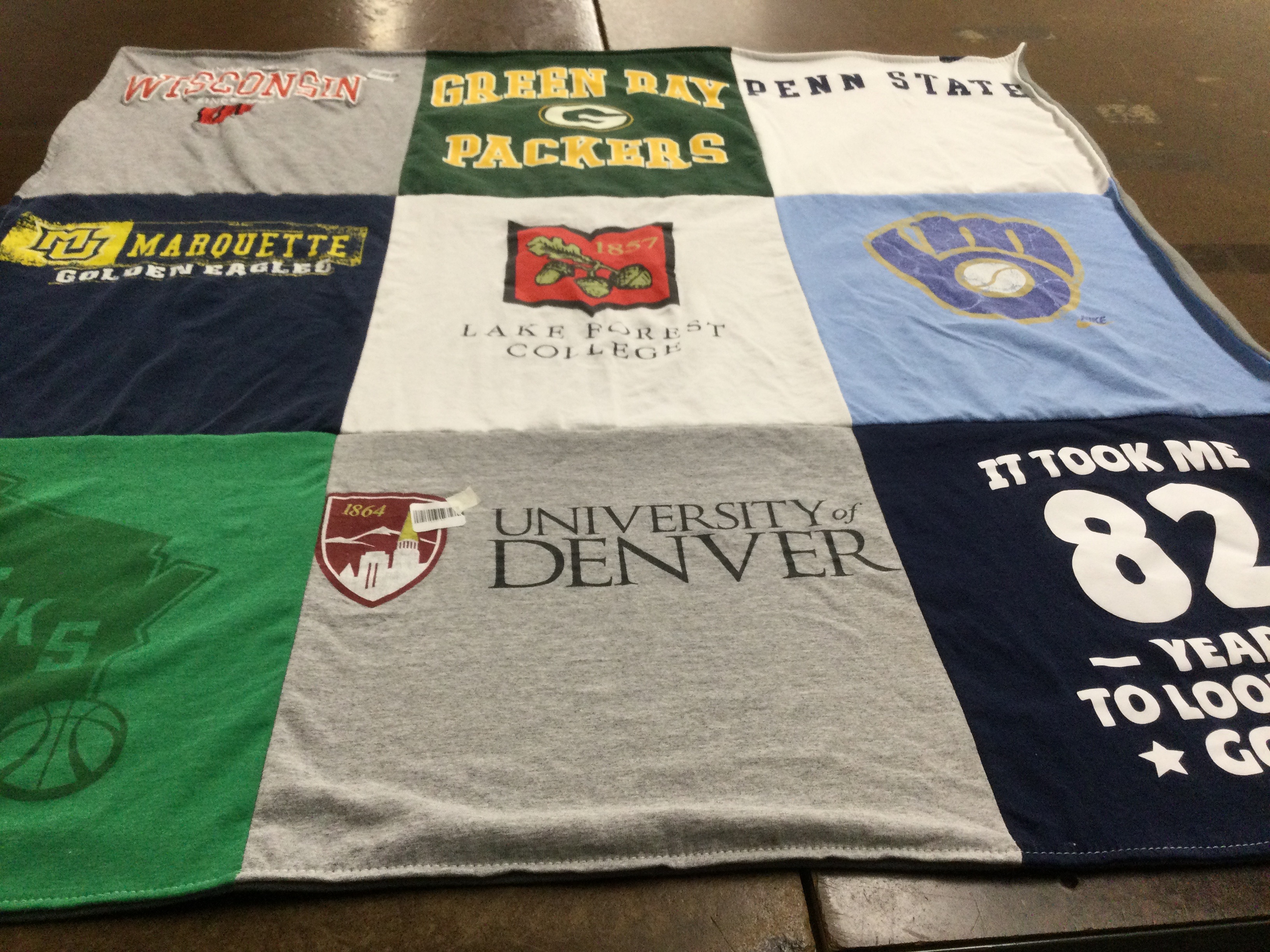 T-shirt quilt featuring green bay packers, marquette golden eagles by Kim from WI