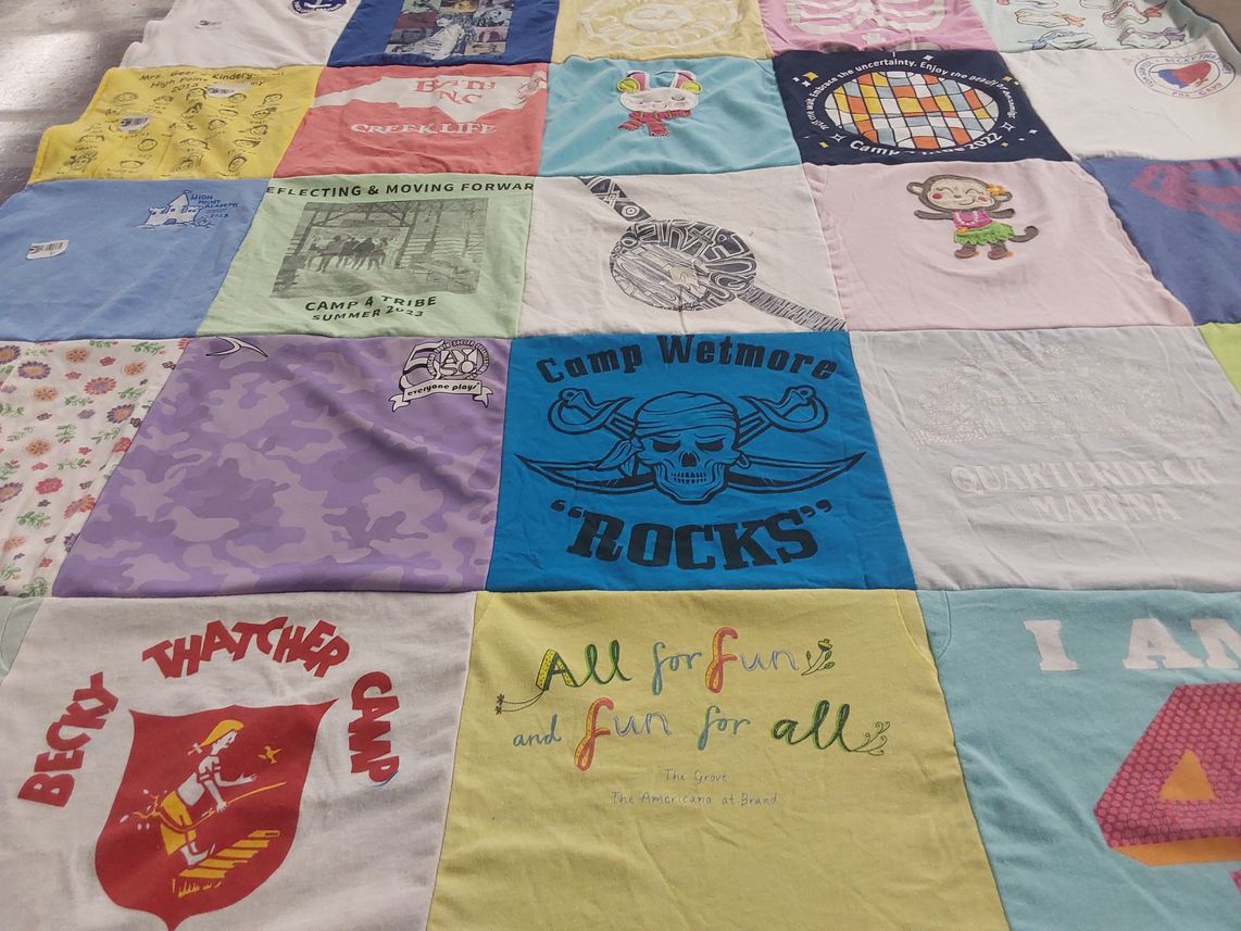 T-shirt quilt with camping, outdoor activities themes by Lindsay from PA