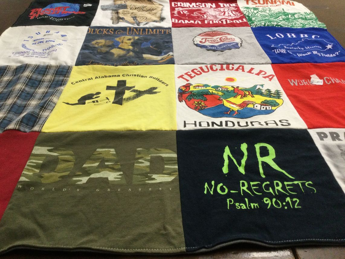 T-shirt quilt with hunting, sports themes by Pete from AL