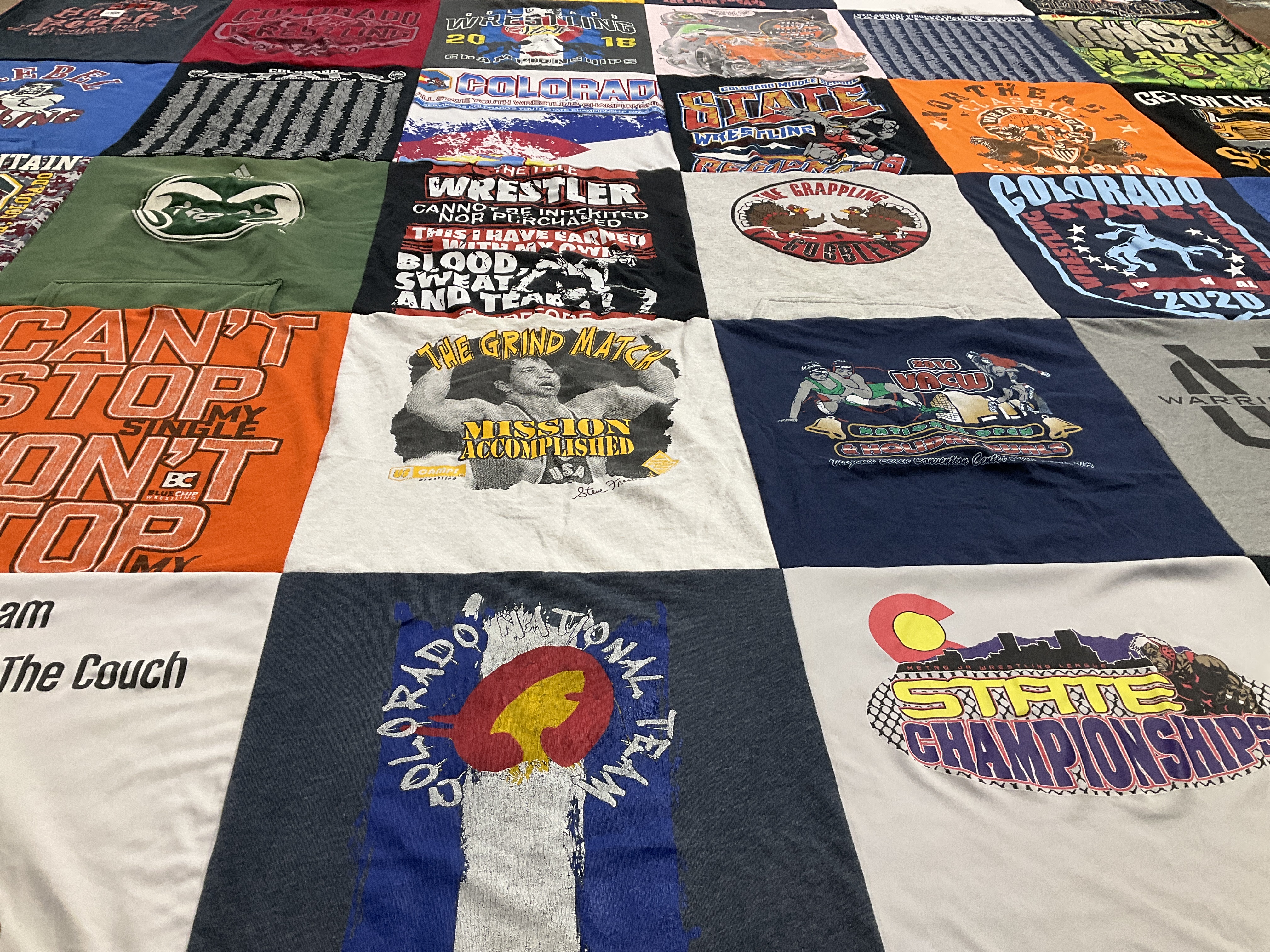 T-shirt quilt with wrestling, sports themes by Leslie from CO