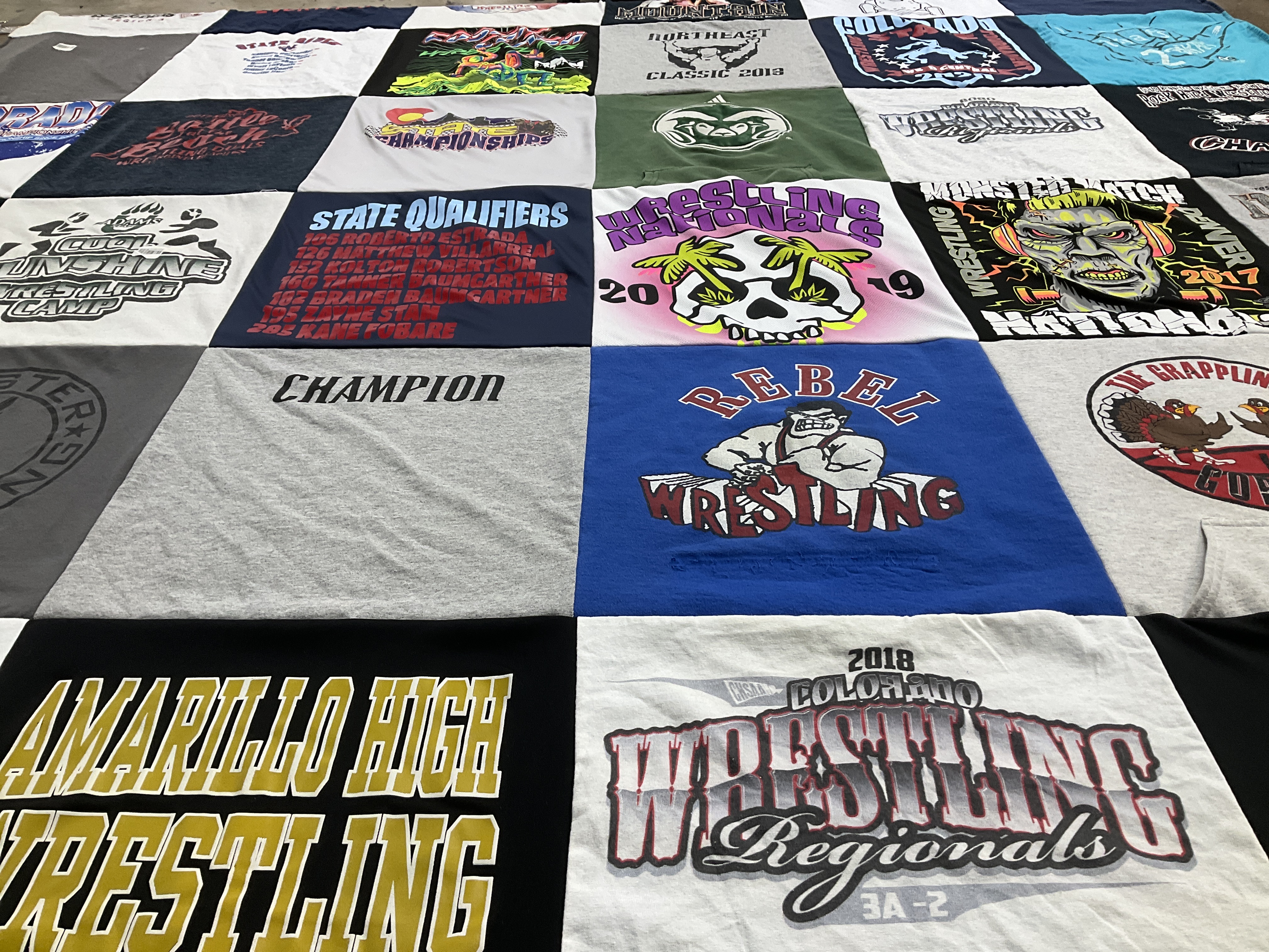 T-shirt quilt featuring wrestling by Leslie from CO