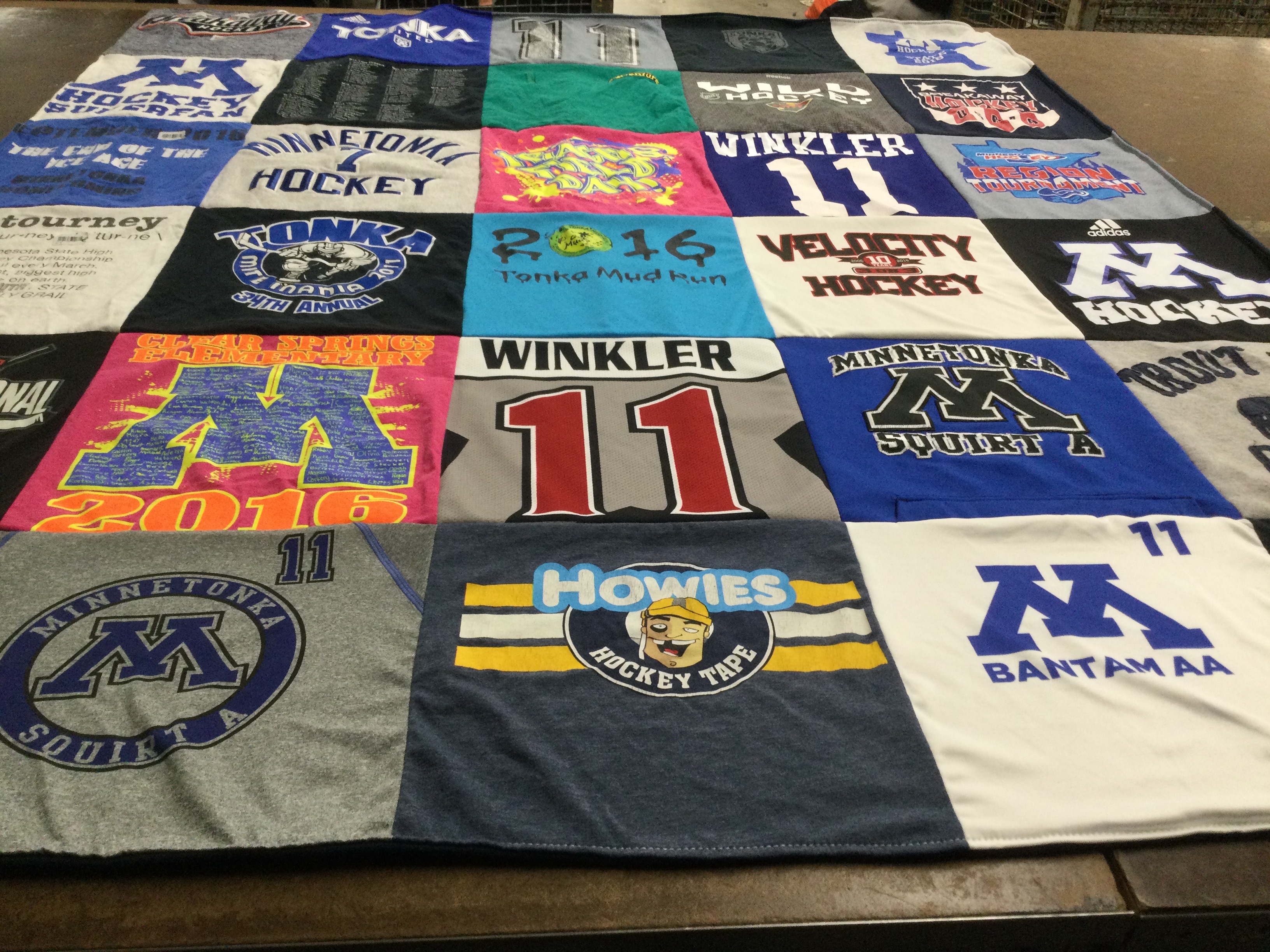 T-shirt quilt featuring minnetonka squirt a hockey, minnetonka bantam aa hockey by Cari from MN