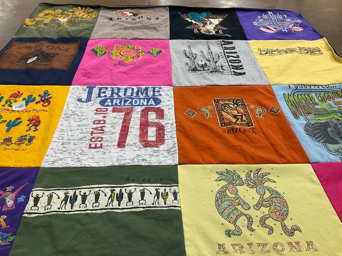T-shirt quilt with souvenirs, travel themes by Angie from IN