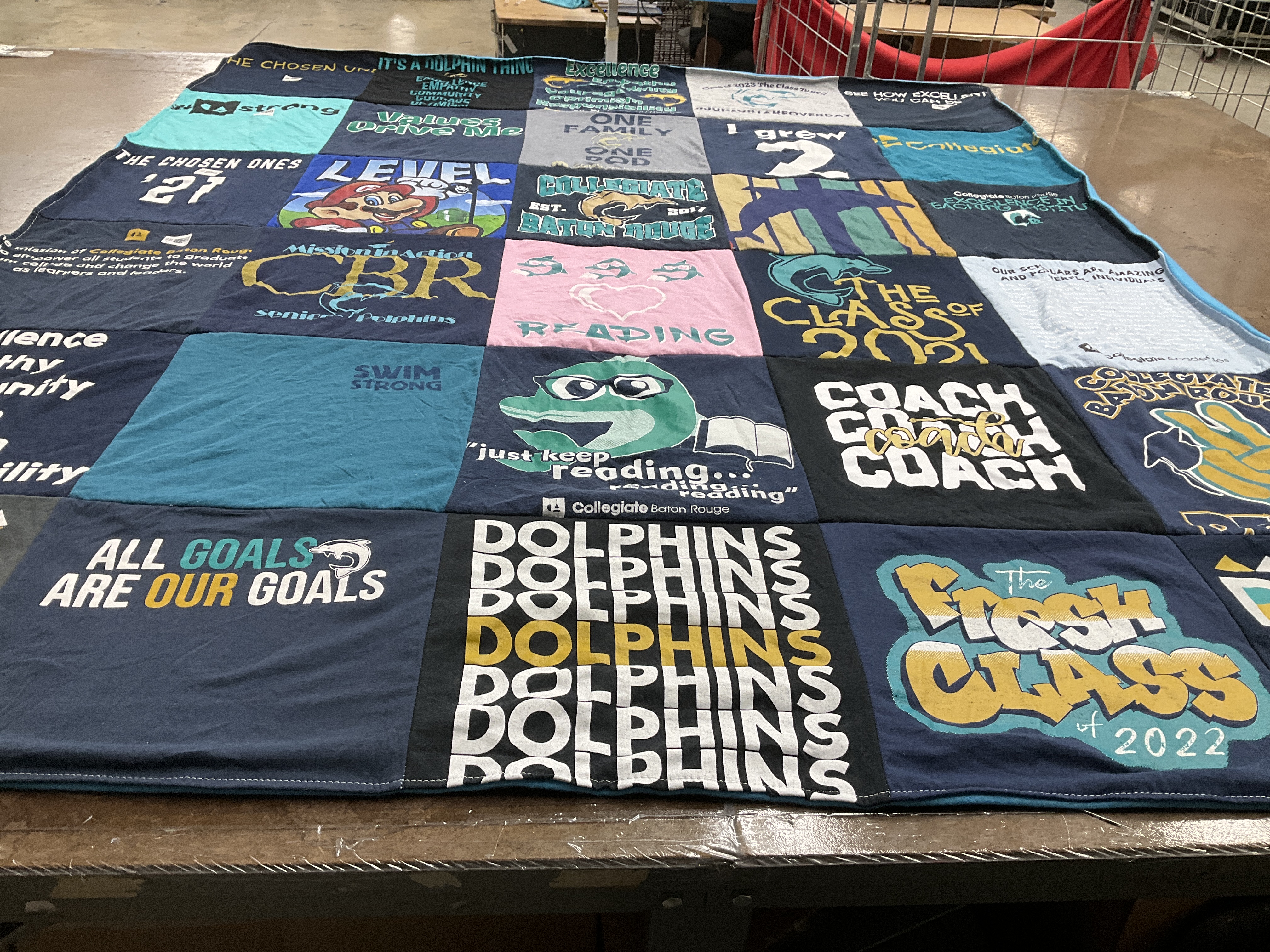 T-shirt quilt with swimming, reading themes by Sam from CA
