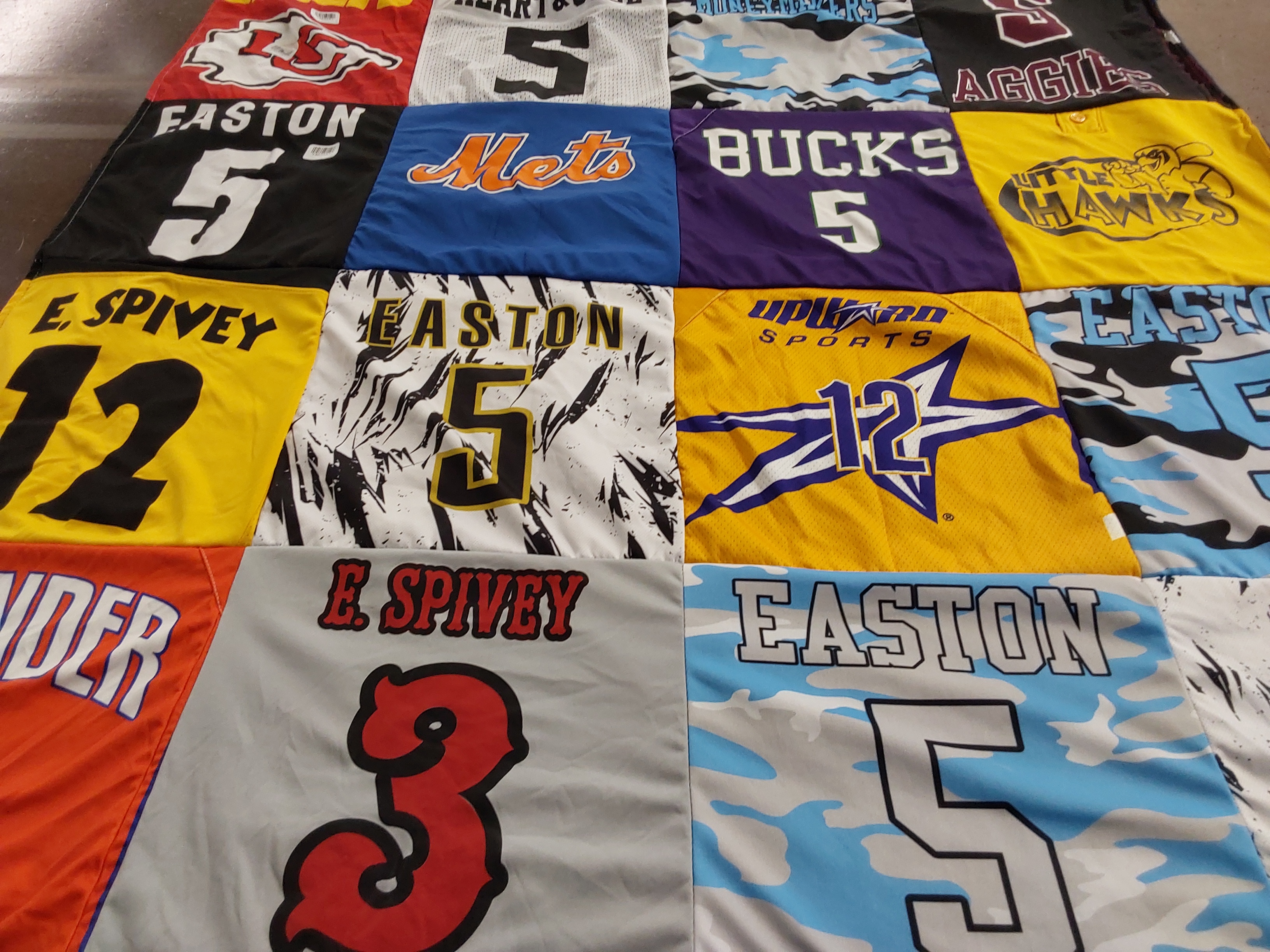 T-shirt quilt with sports themes by Amber from TX