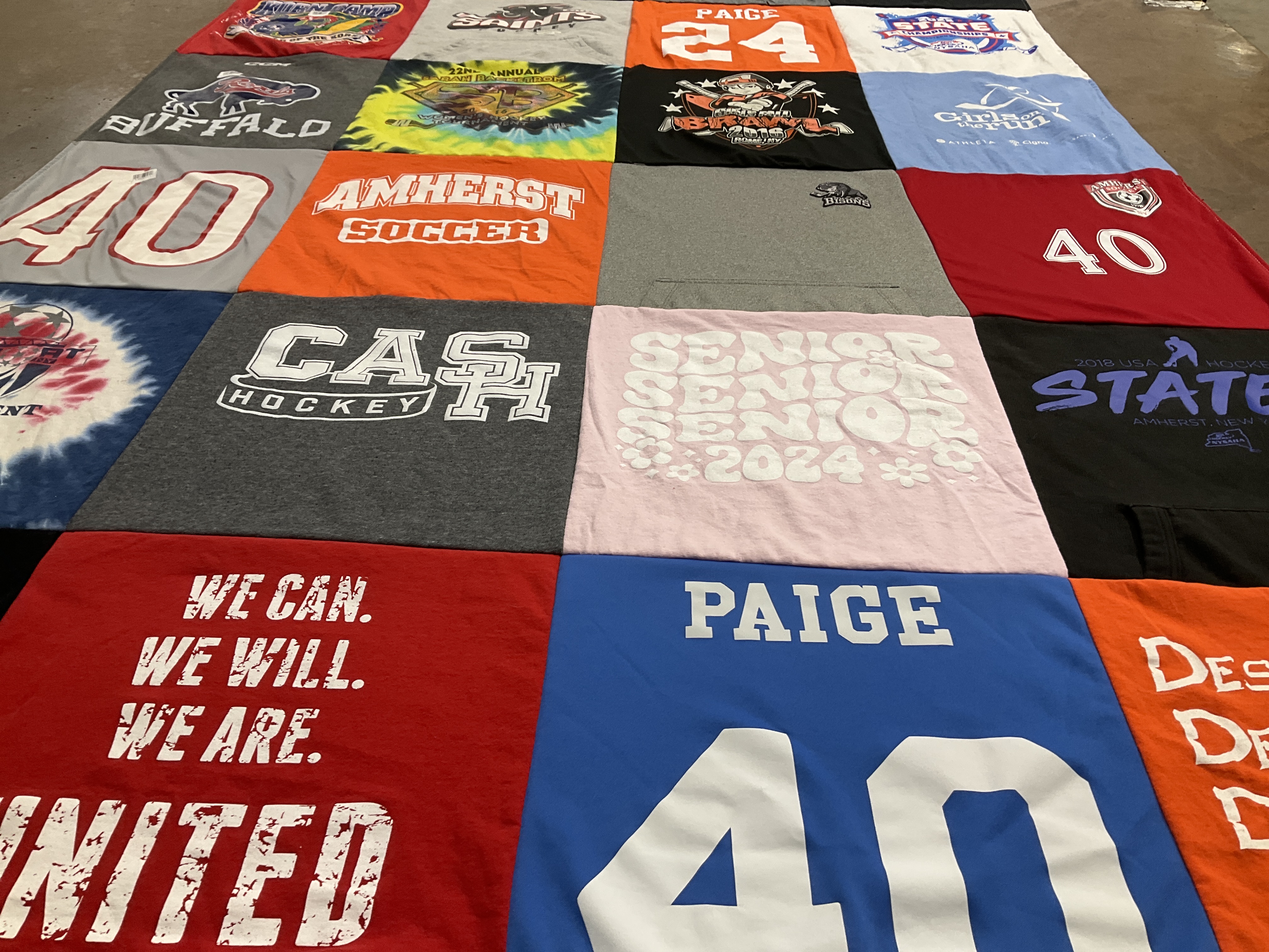 T-shirt quilt featuring amherst junior senior high school hockey team by Michelle from NY