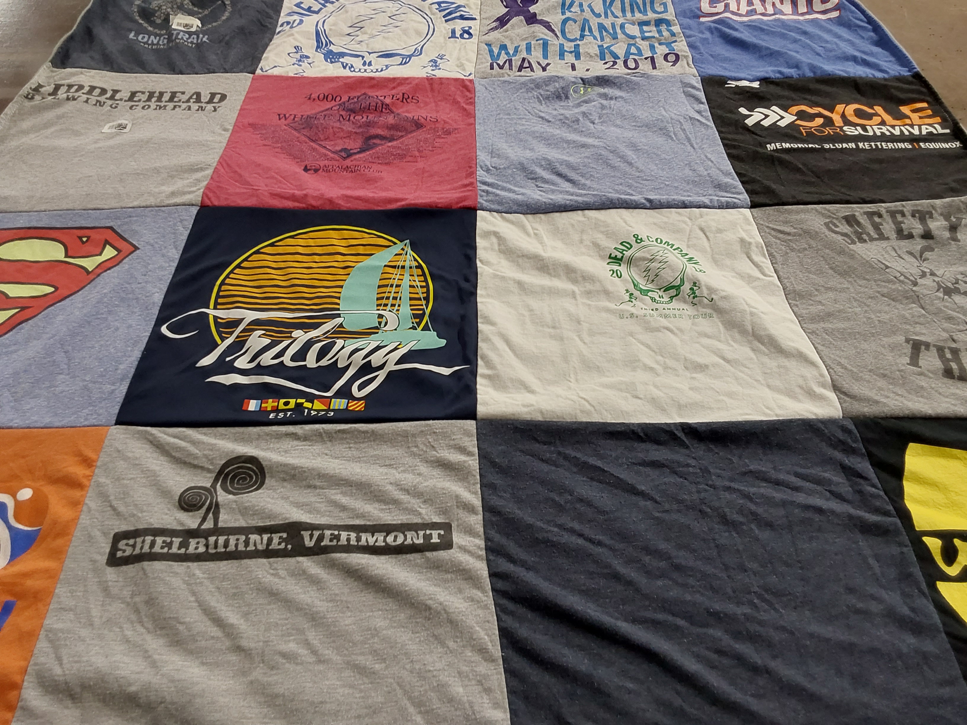 T-shirt quilt with brewing, cycling themes by Joey from NY