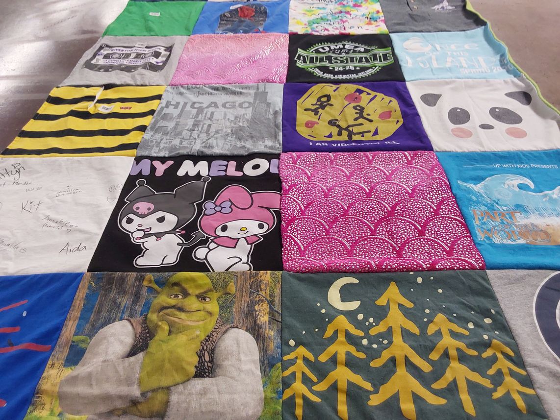 T-shirt quilt with art, music themes by Jennifer from UT
