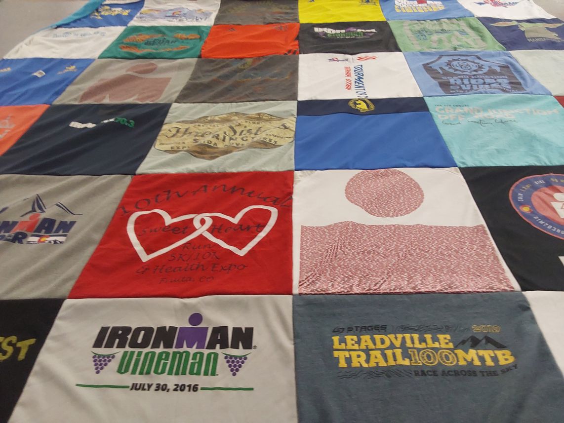T-shirt quilt with running, mountain biking themes by Bonnie from CO