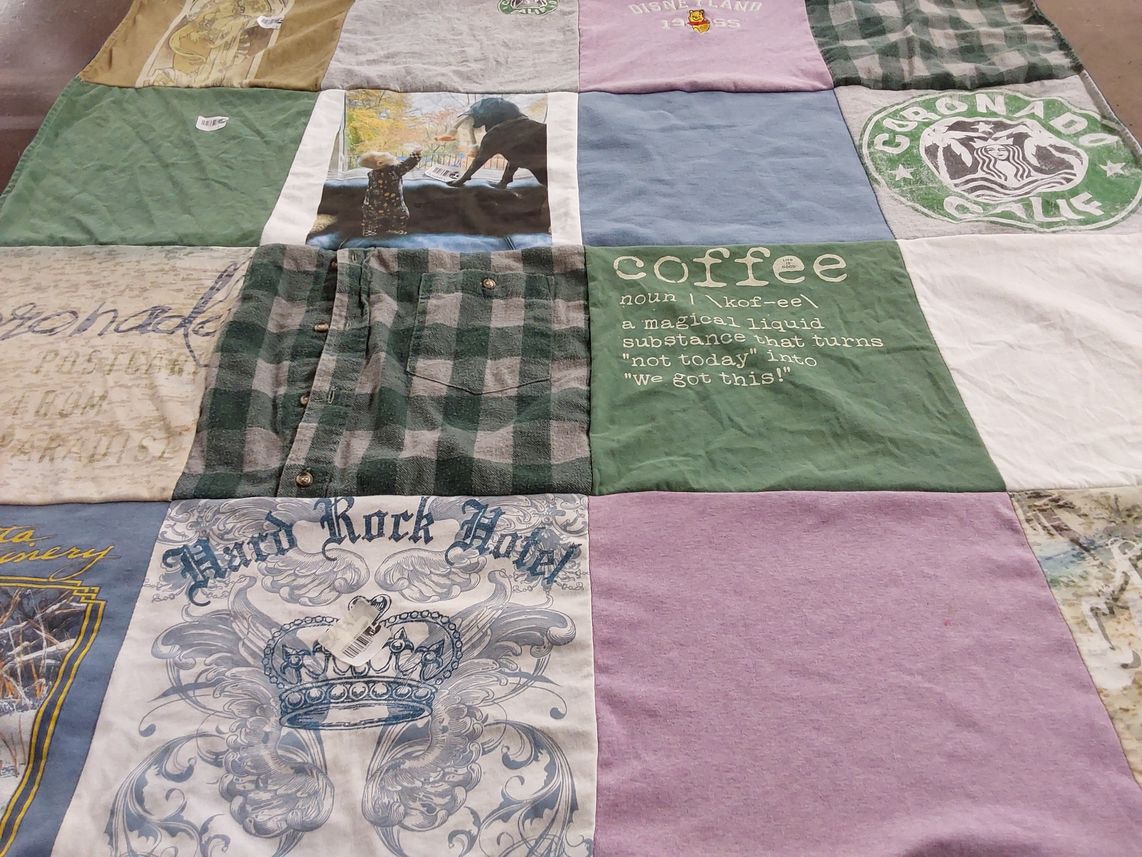T-shirt quilt with travel, coffee themes by Elise from CA