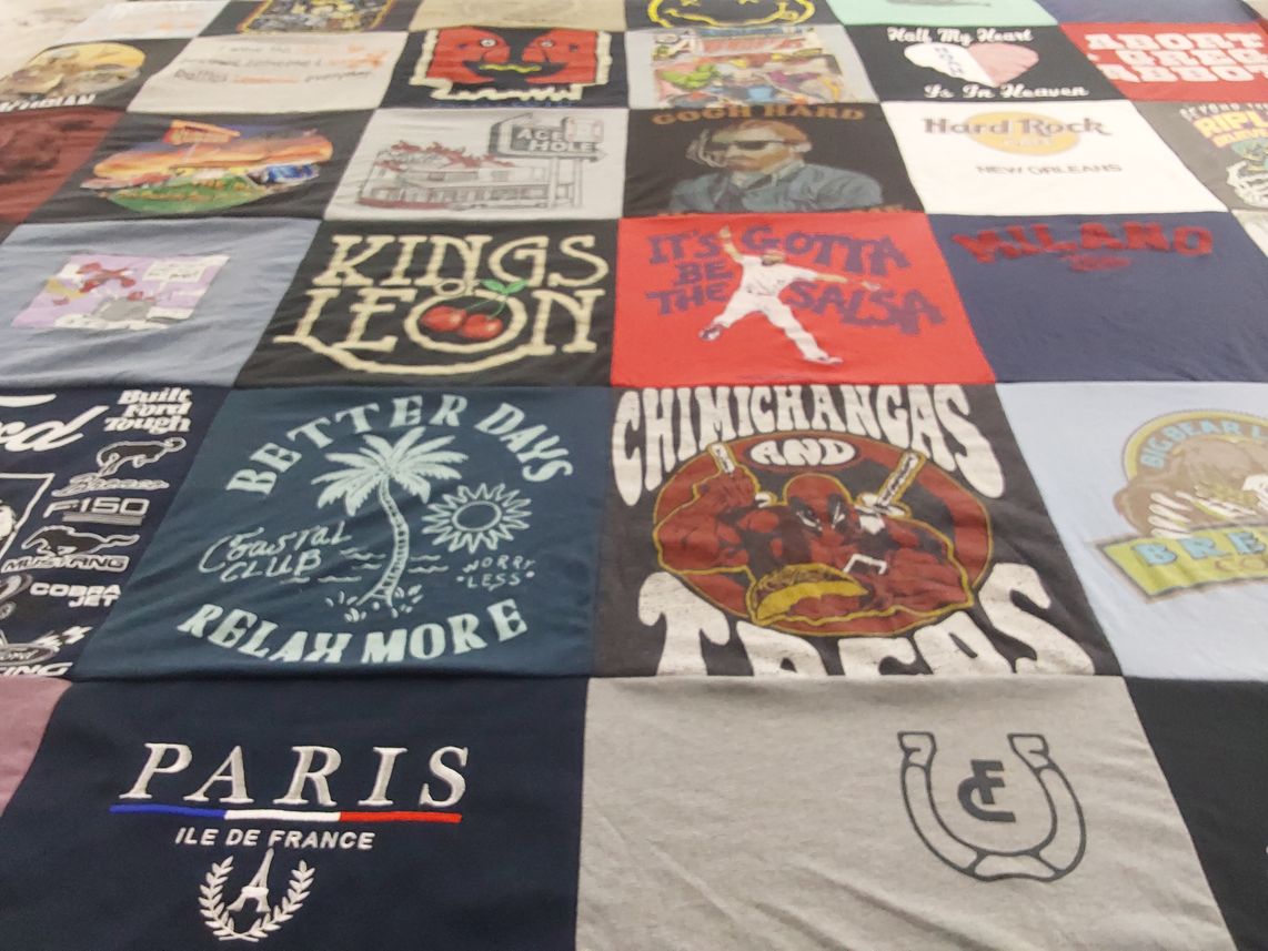 T-shirt quilt with music, food themes by Genevieve from TX