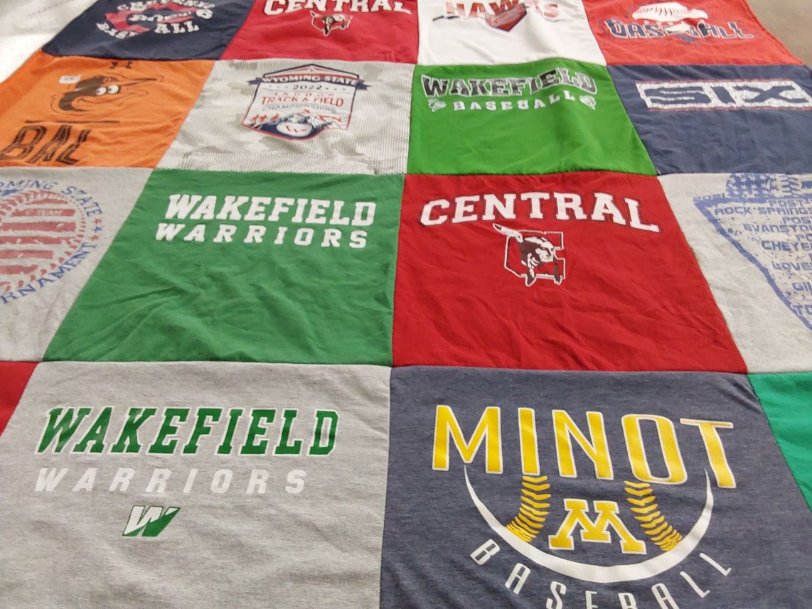 T-shirt quilt featuring wakefield warriors, central high school hawks by Bill from VA
