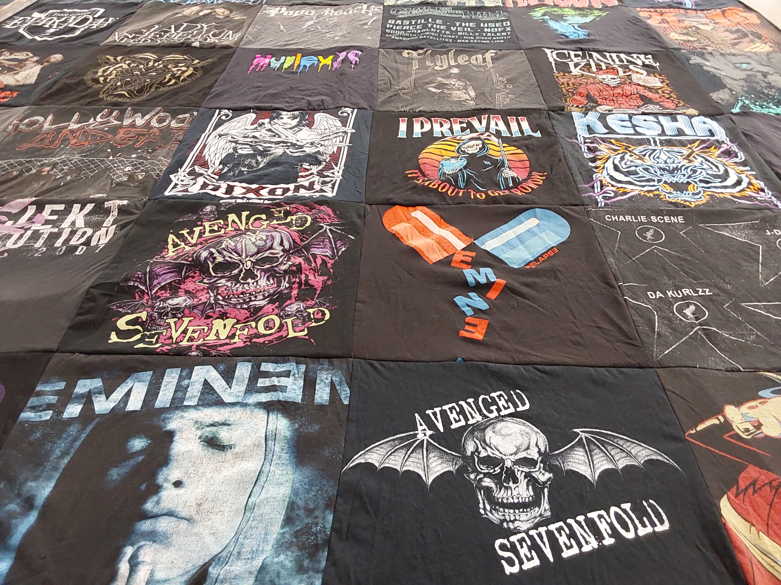T-shirt quilt with music, rock themes by Joanell from MI