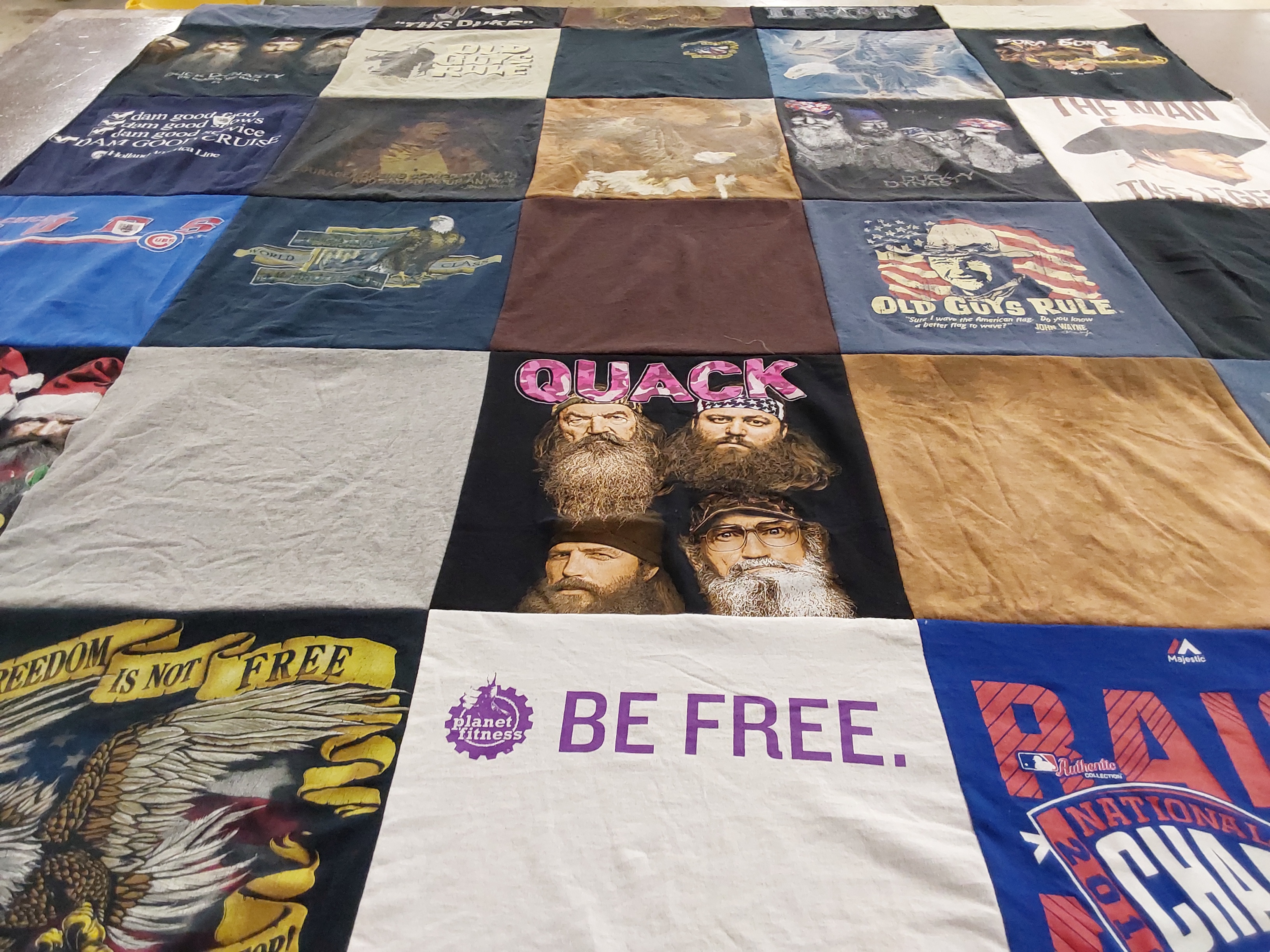 T-shirt quilt with musical, television themes by Kathryn from IL