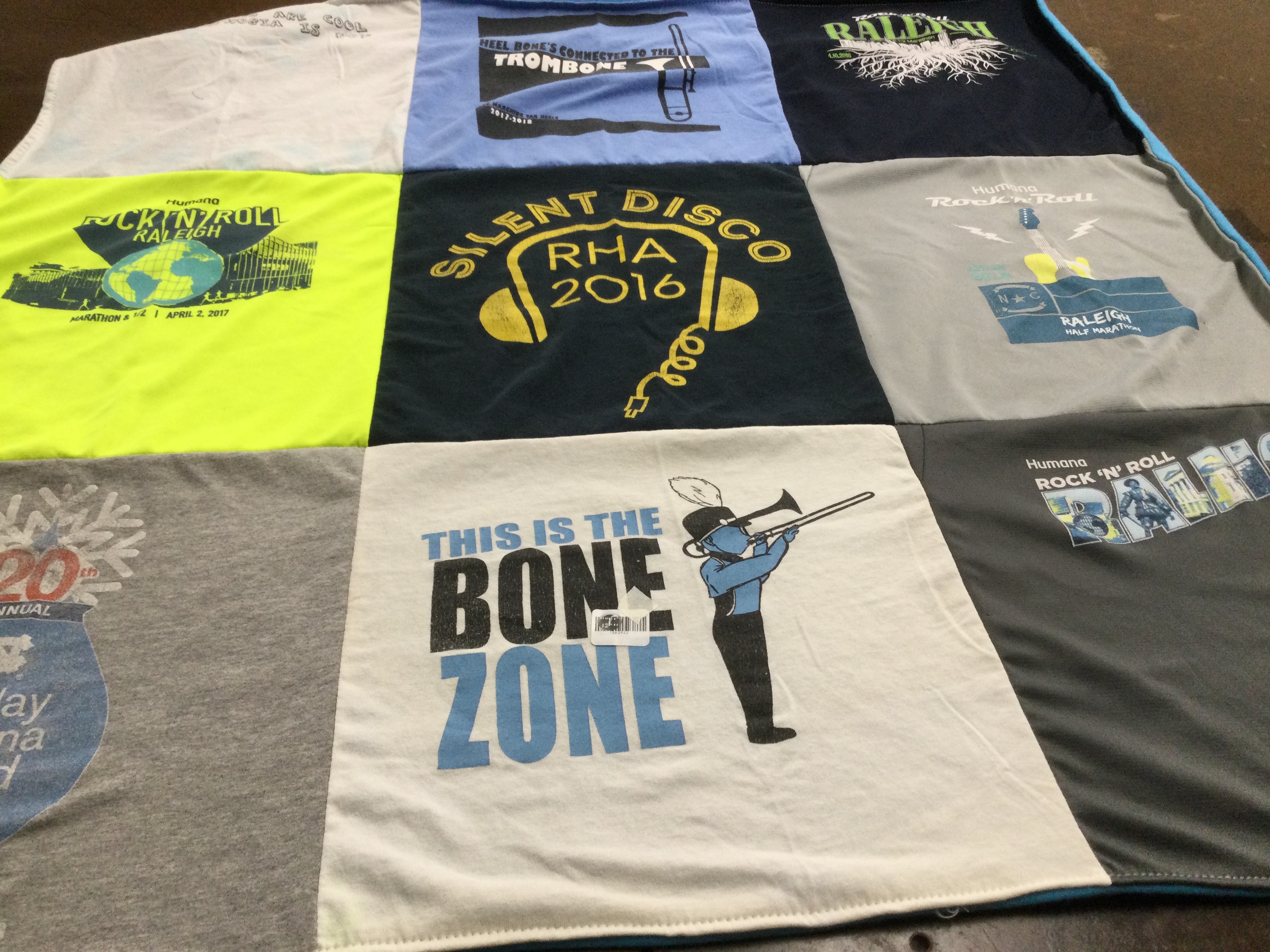 T-shirt quilt with running, music themes by Kristen from WV