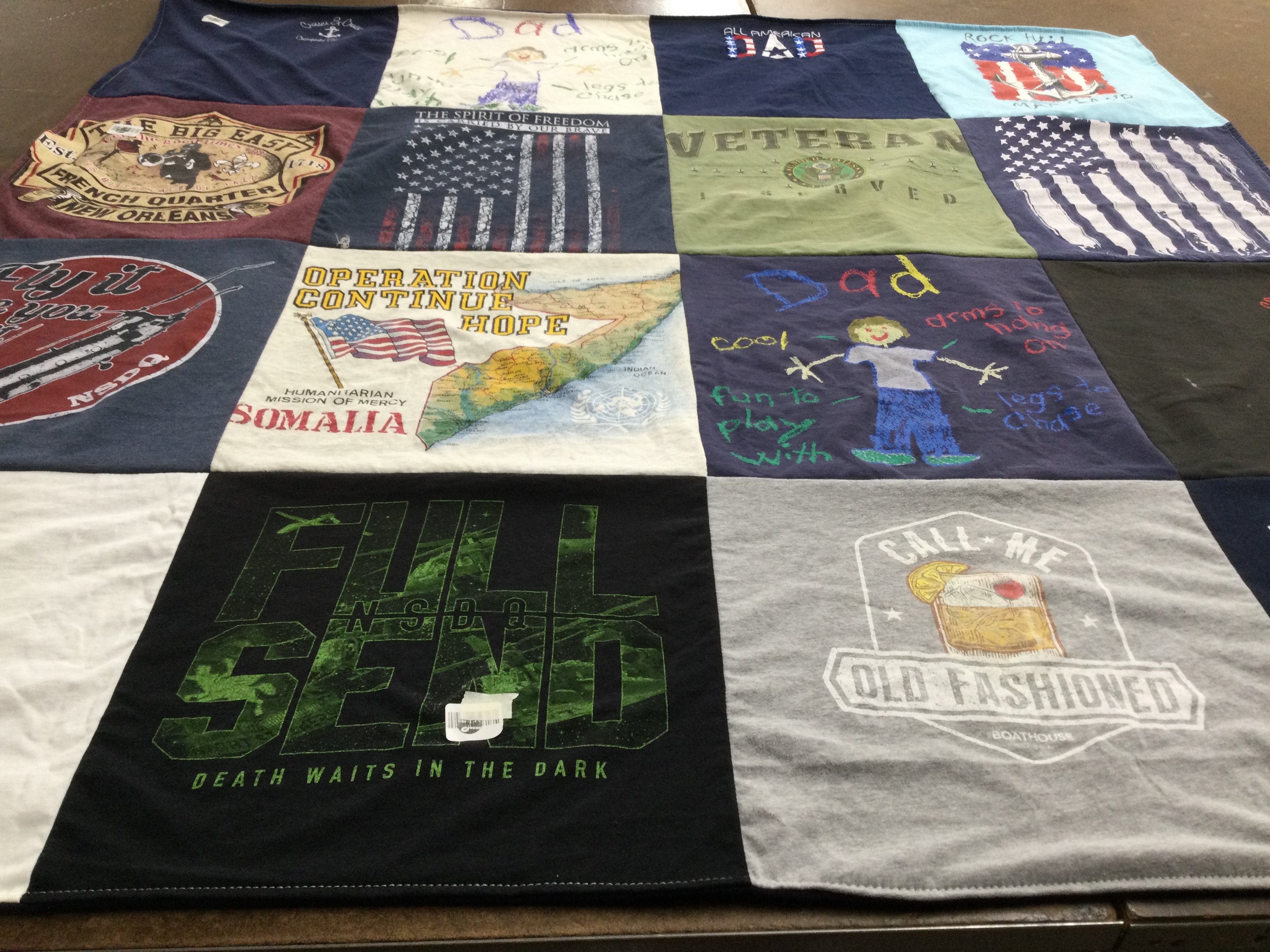 T-shirt quilt with military, veterans themes by Clarence from MD
