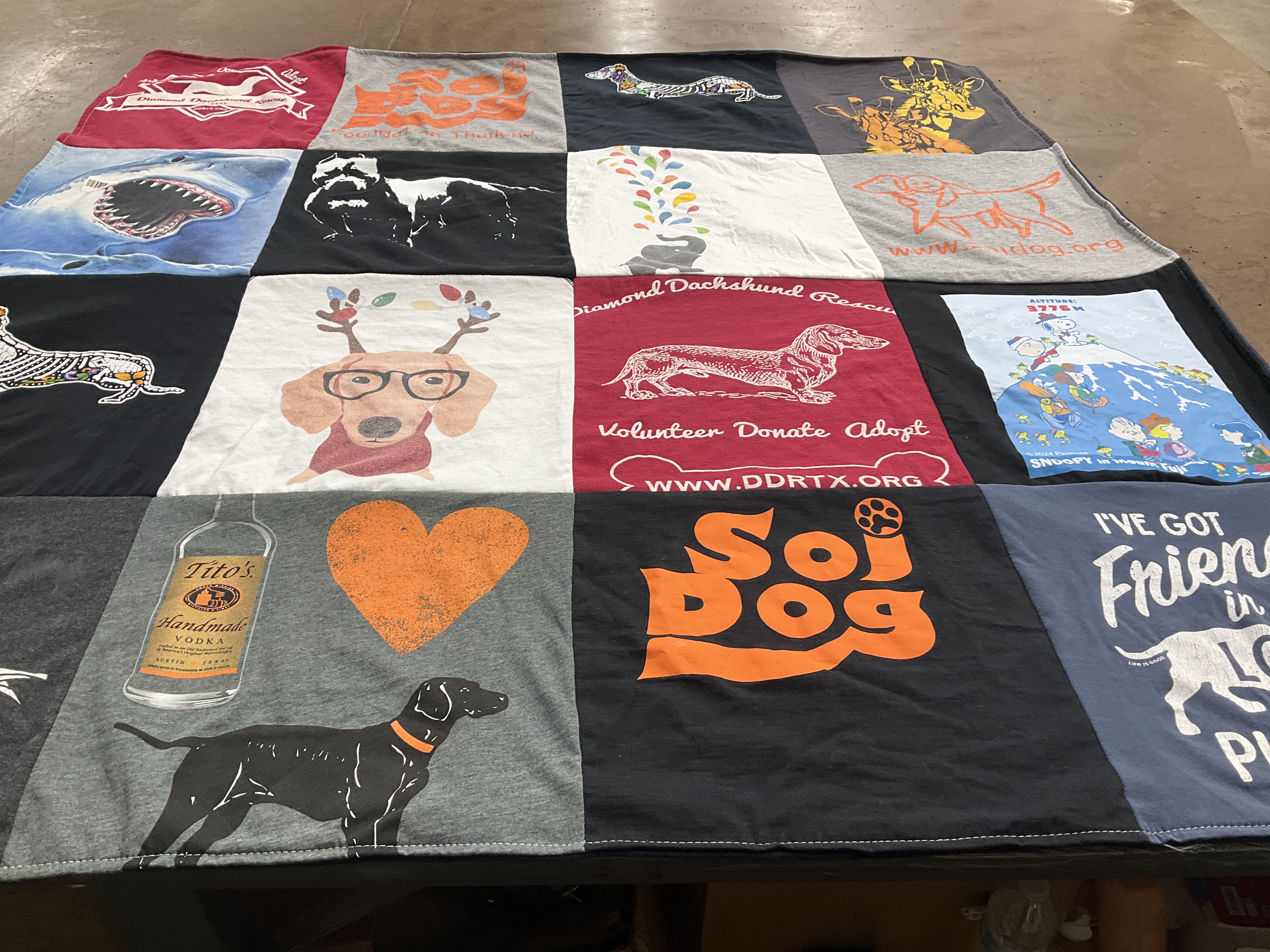 T-shirt quilt with animal rescue, dog adoption themes by Letty from TX