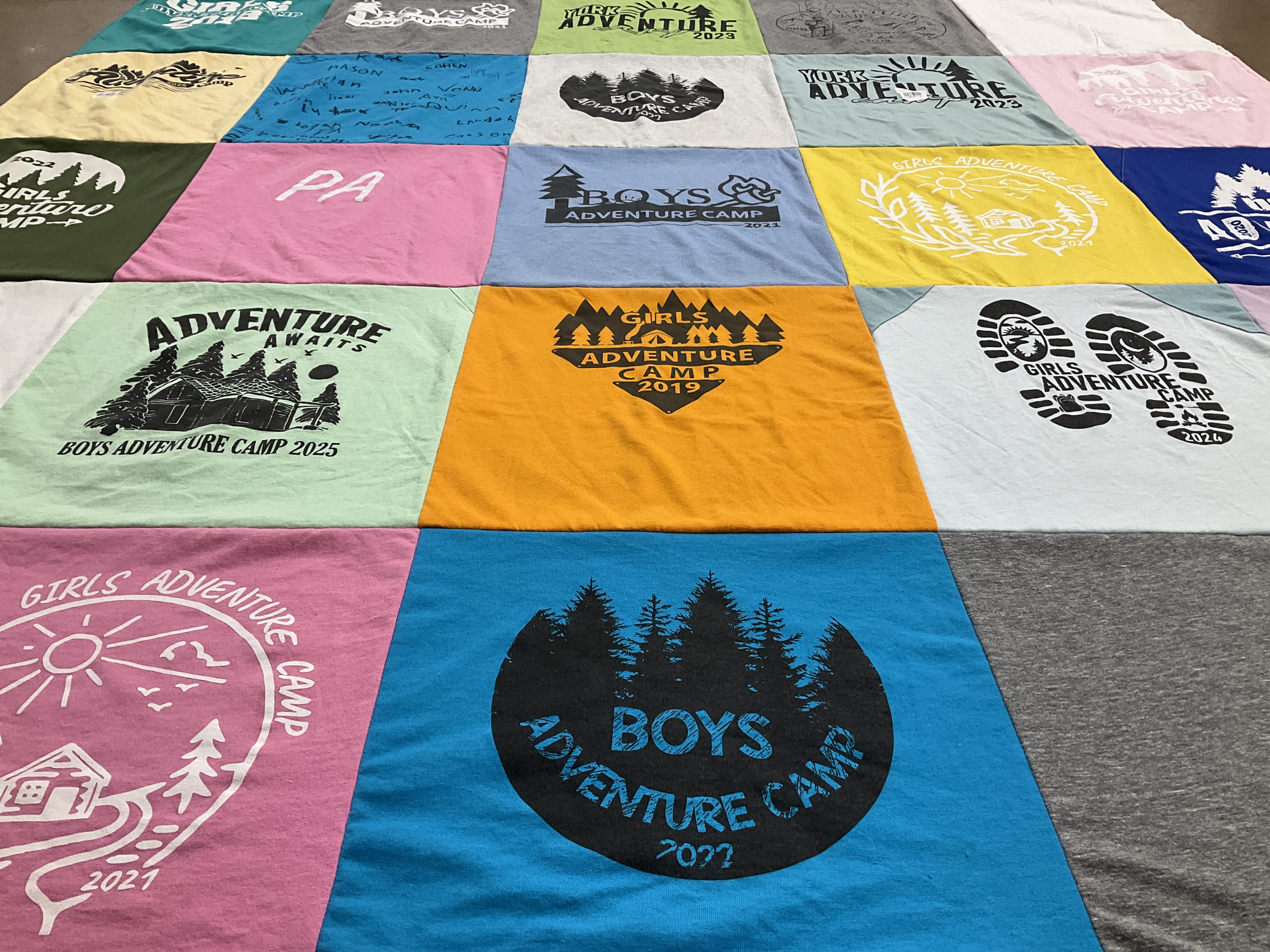 T-shirt quilt with camping, outdoor activities themes by David from PA