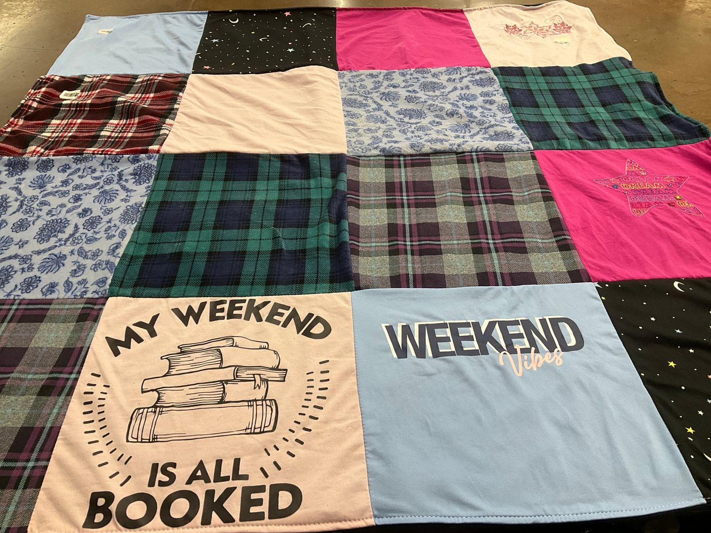 T-shirt quilt with reading, weekends themes by Jennifer from NC