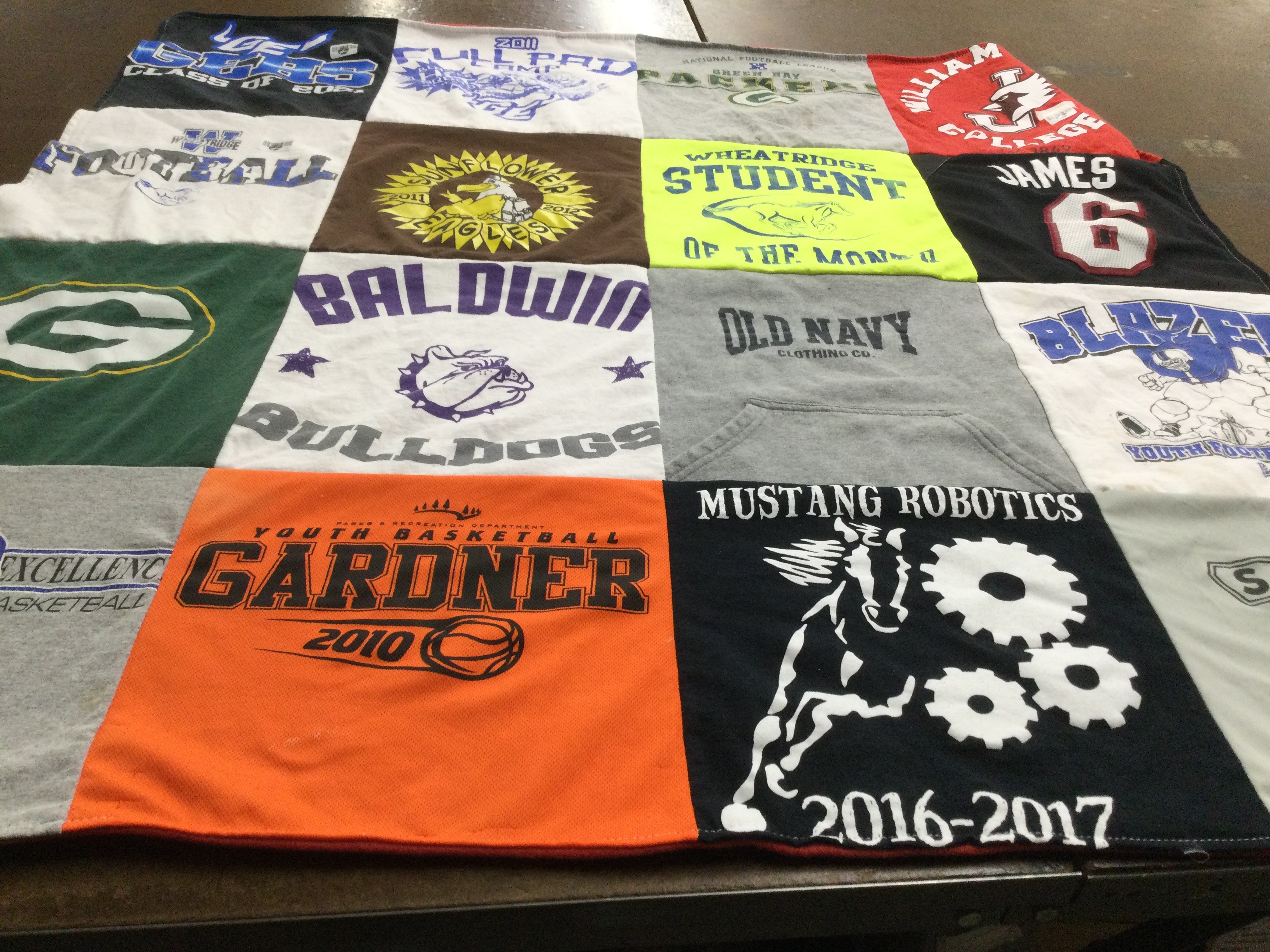 T-shirt quilt featuring blazers by Joellyn from KS