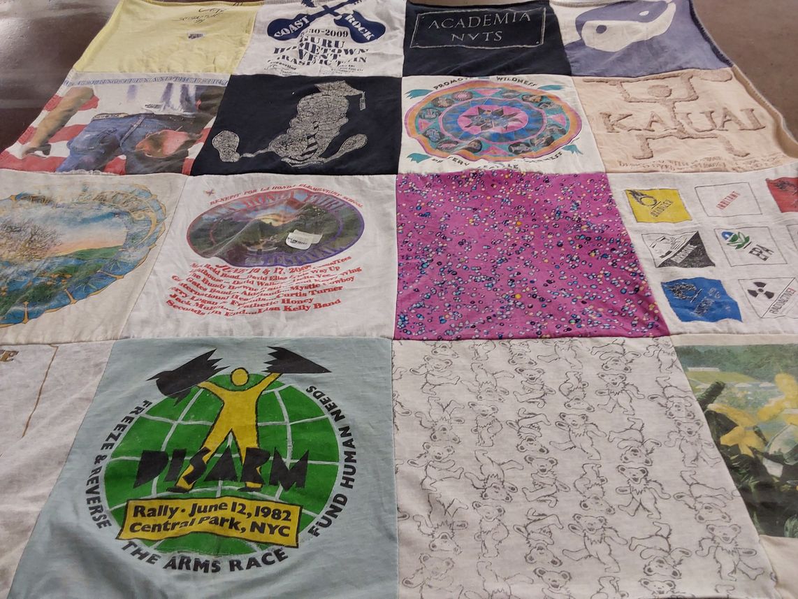 T-shirt quilt with environment, wildlife themes by wendi from CA