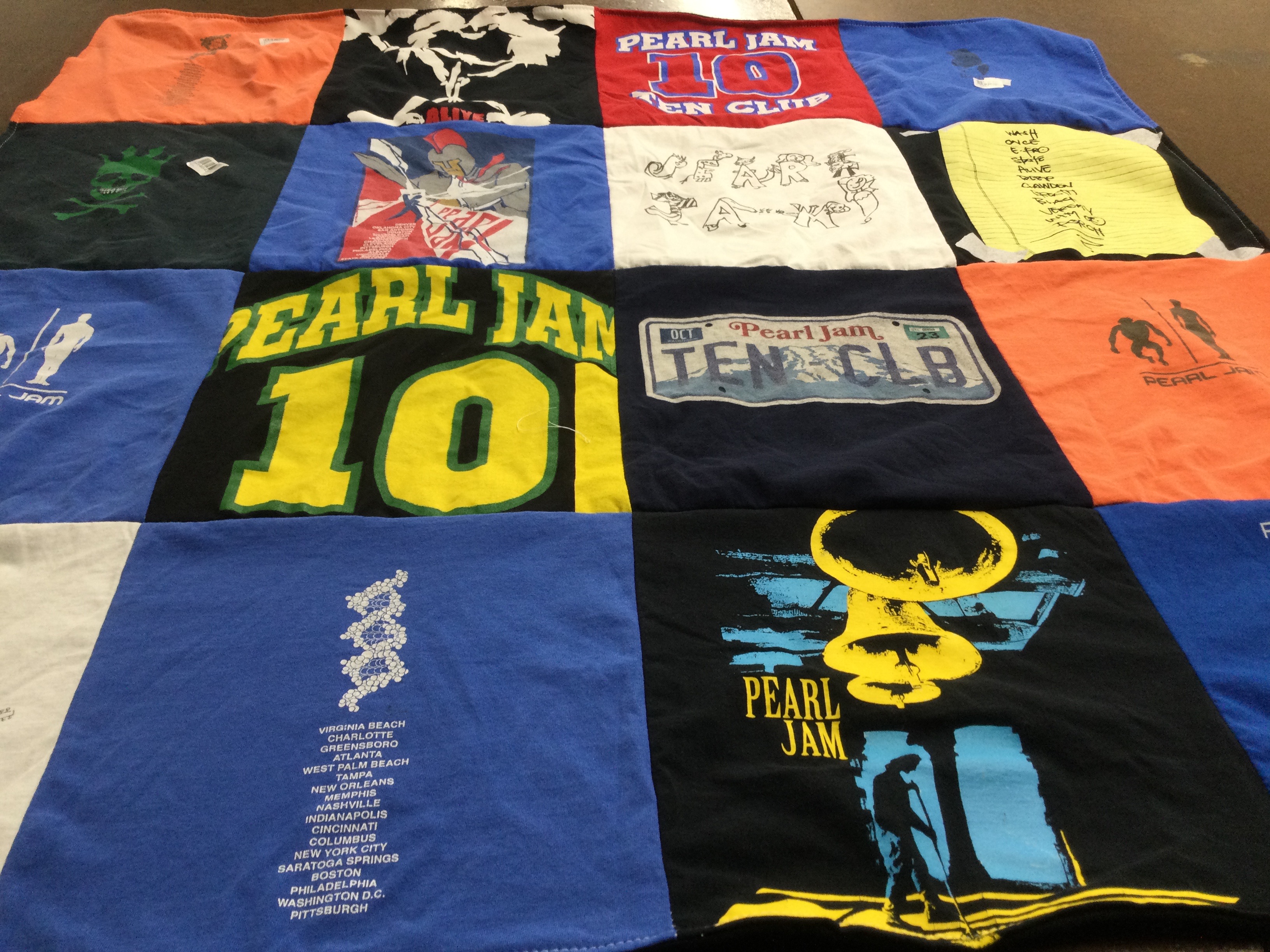 T-shirt quilt with music, concerts themes by Kristyn from NY
