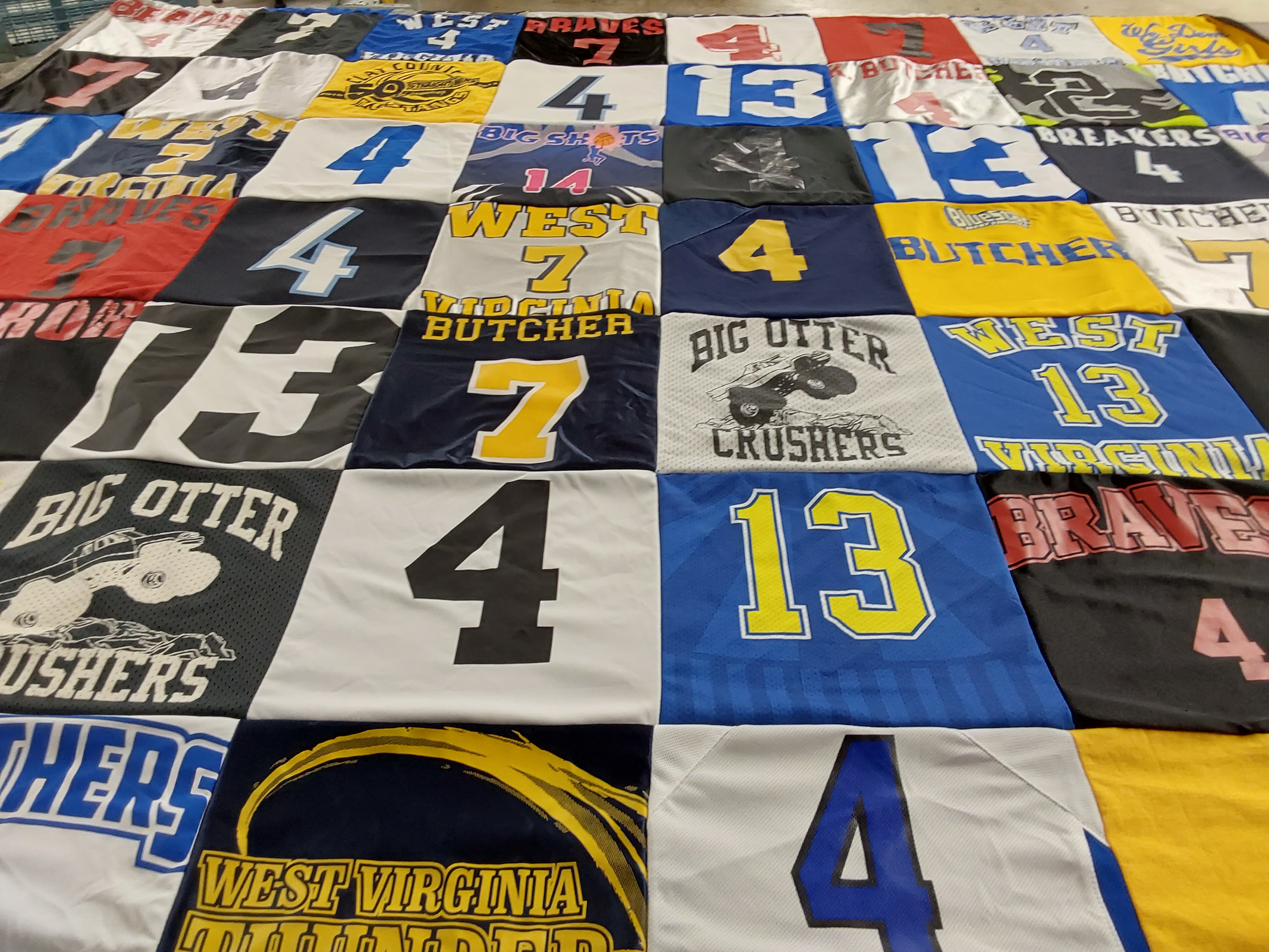 T-shirt quilt with sports, community themes by Breanne from WV
