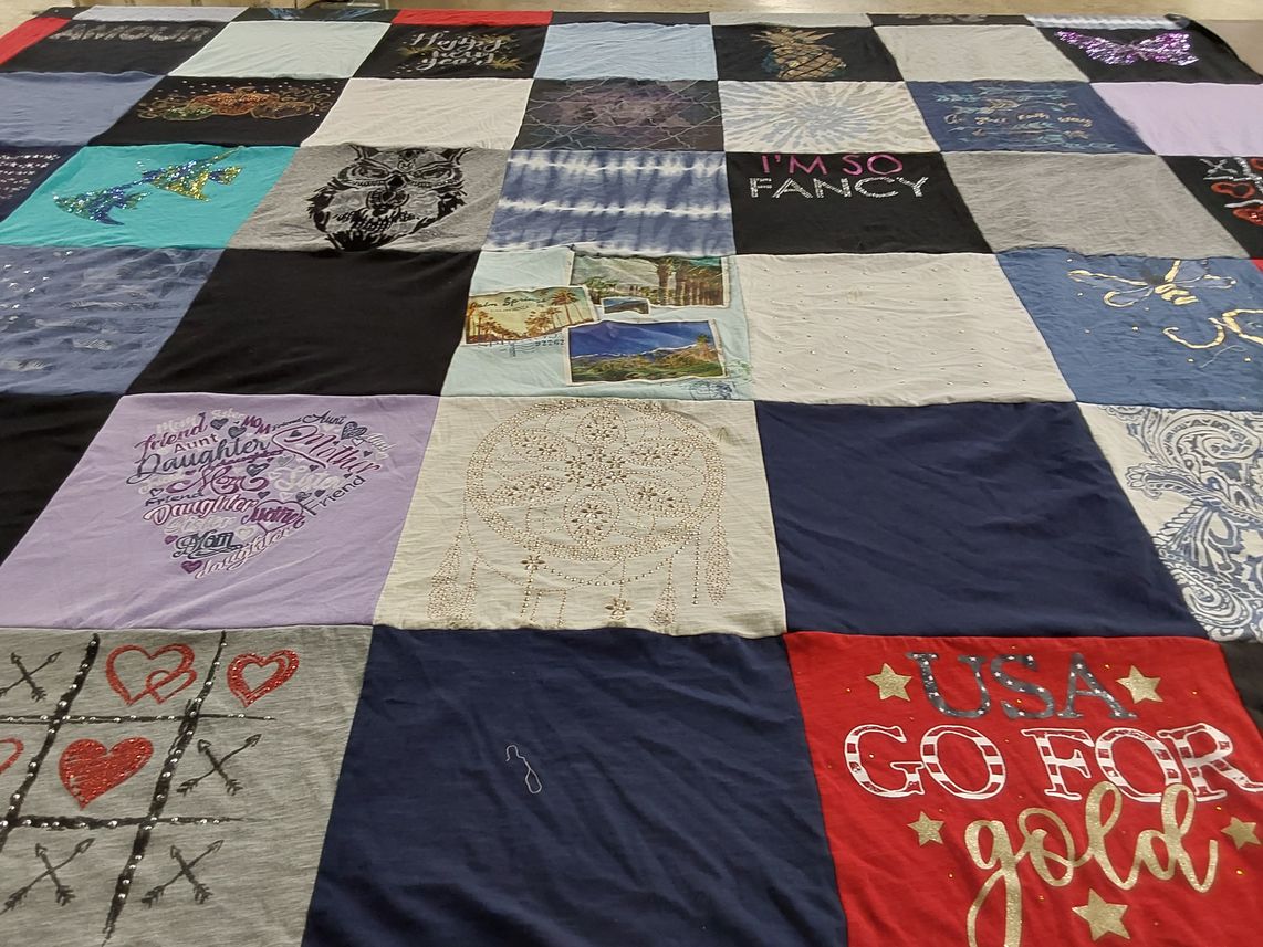 T-shirt quilt with family, art themes by Jennifer from TN