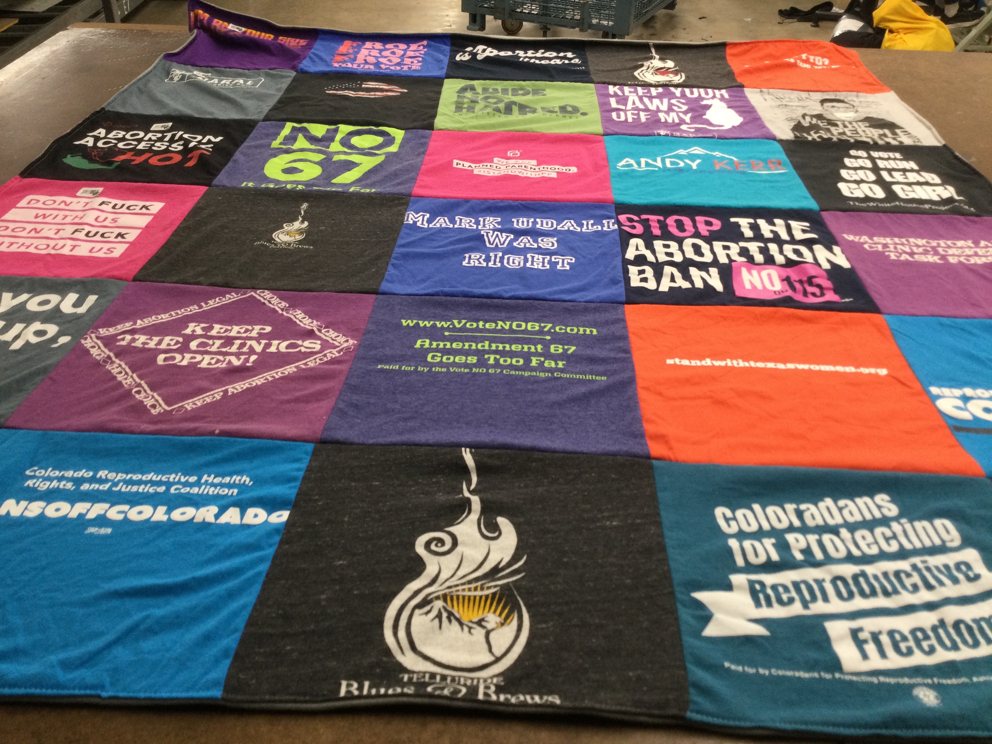 T-shirt quilt with reproductive rights, abortion access themes by Laura from CO