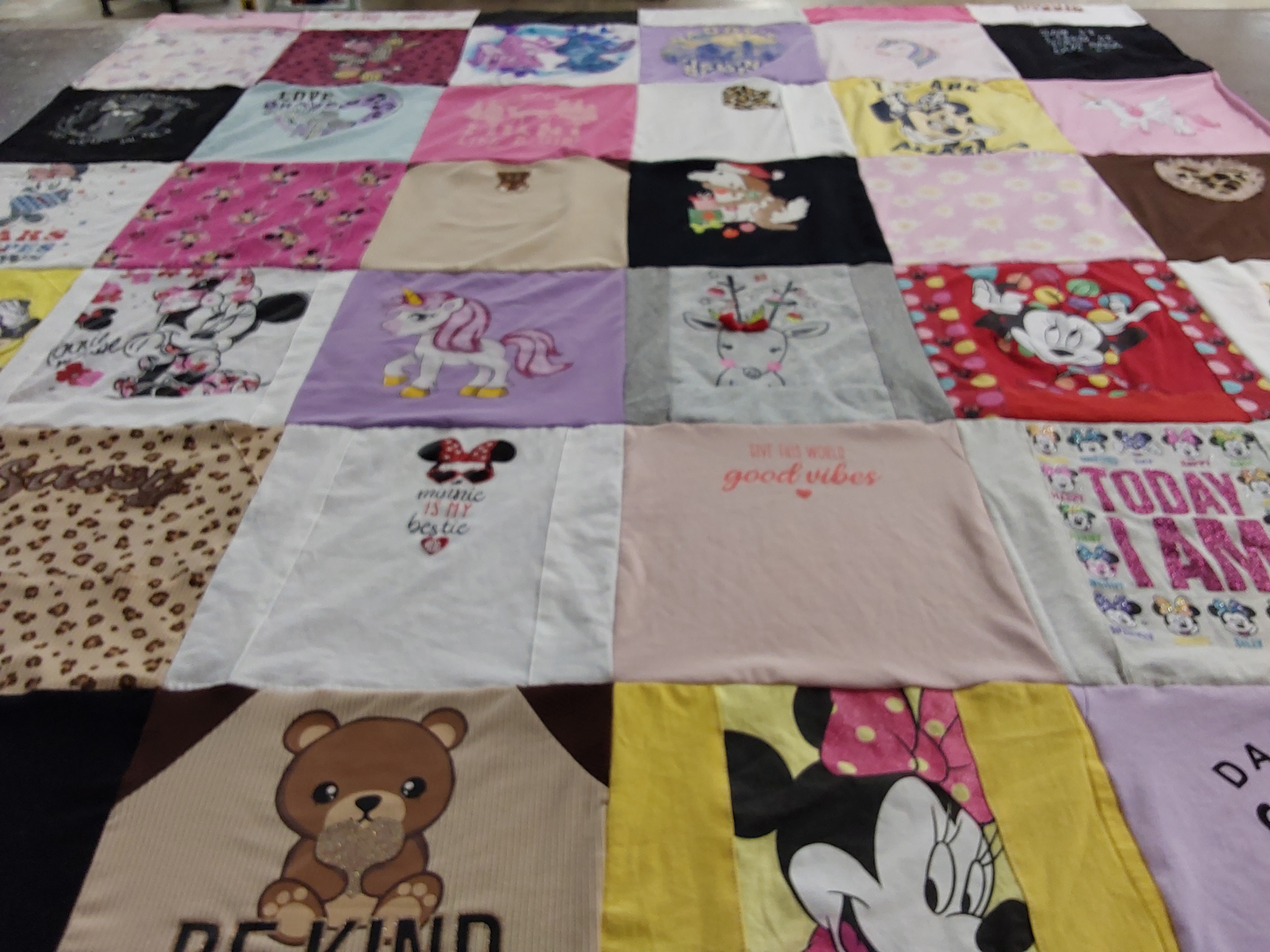 T-shirt quilt with disney, animals themes by Brenda from GA