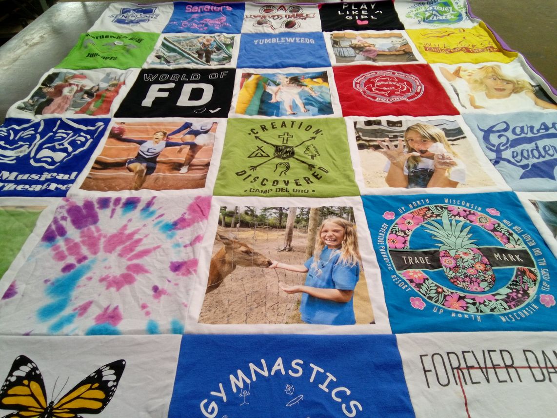 T-shirt quilt with theatre, gymnastics themes by Nancy from NV