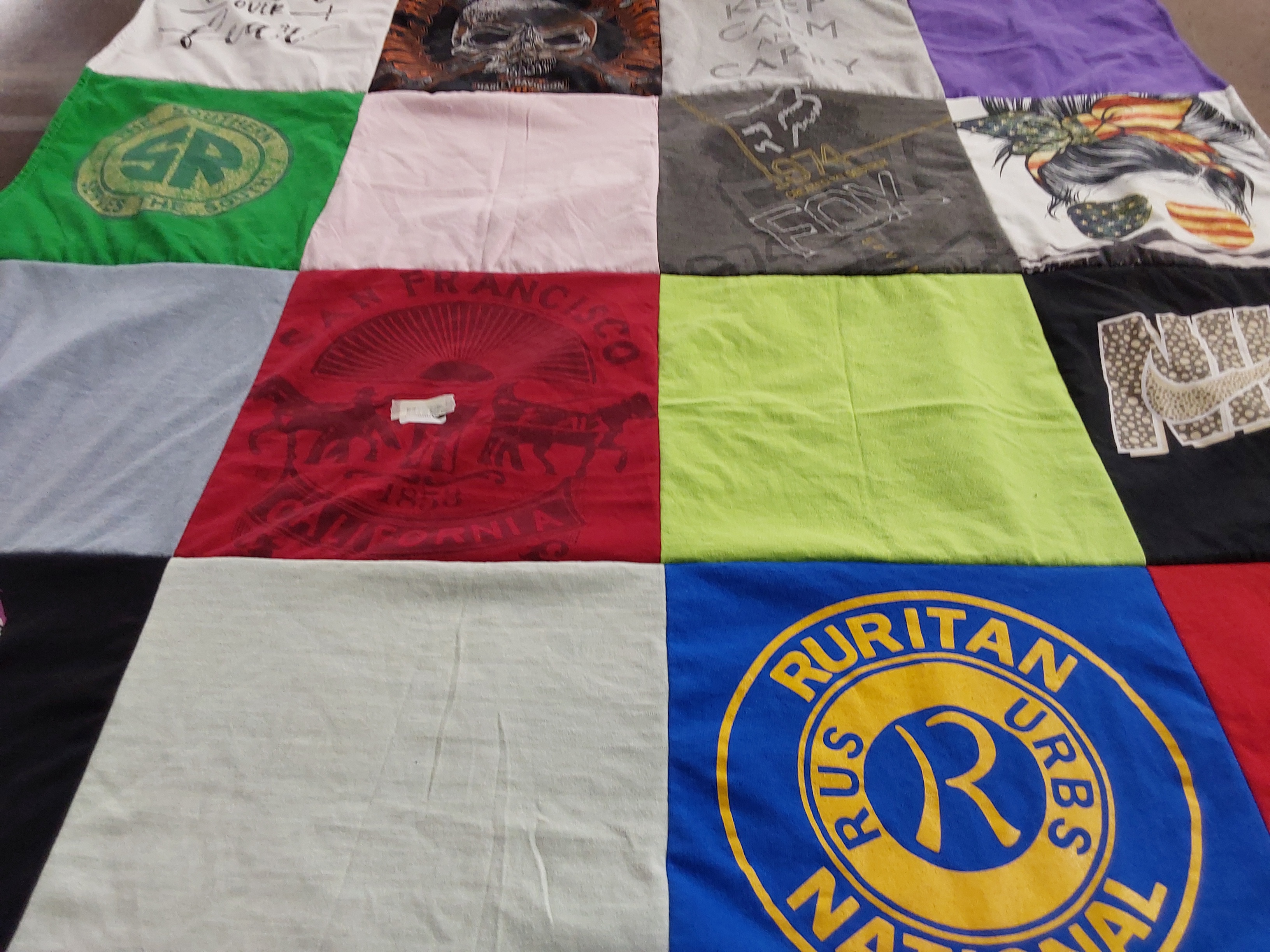 T-shirt quilt with travel, fitness themes by Stephanie from WV