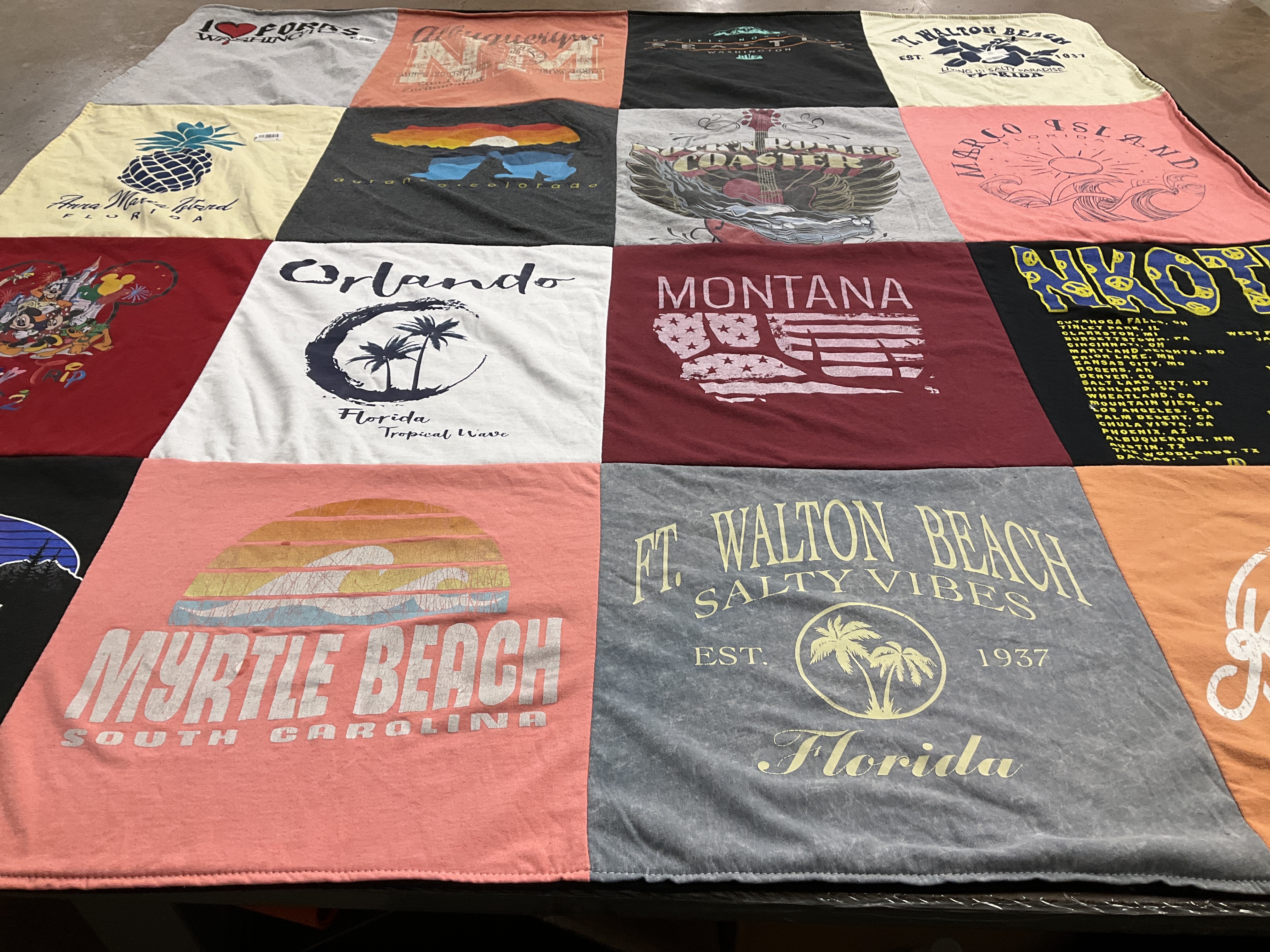 T-shirt quilt with travel, beaches themes by Tanya from LA
