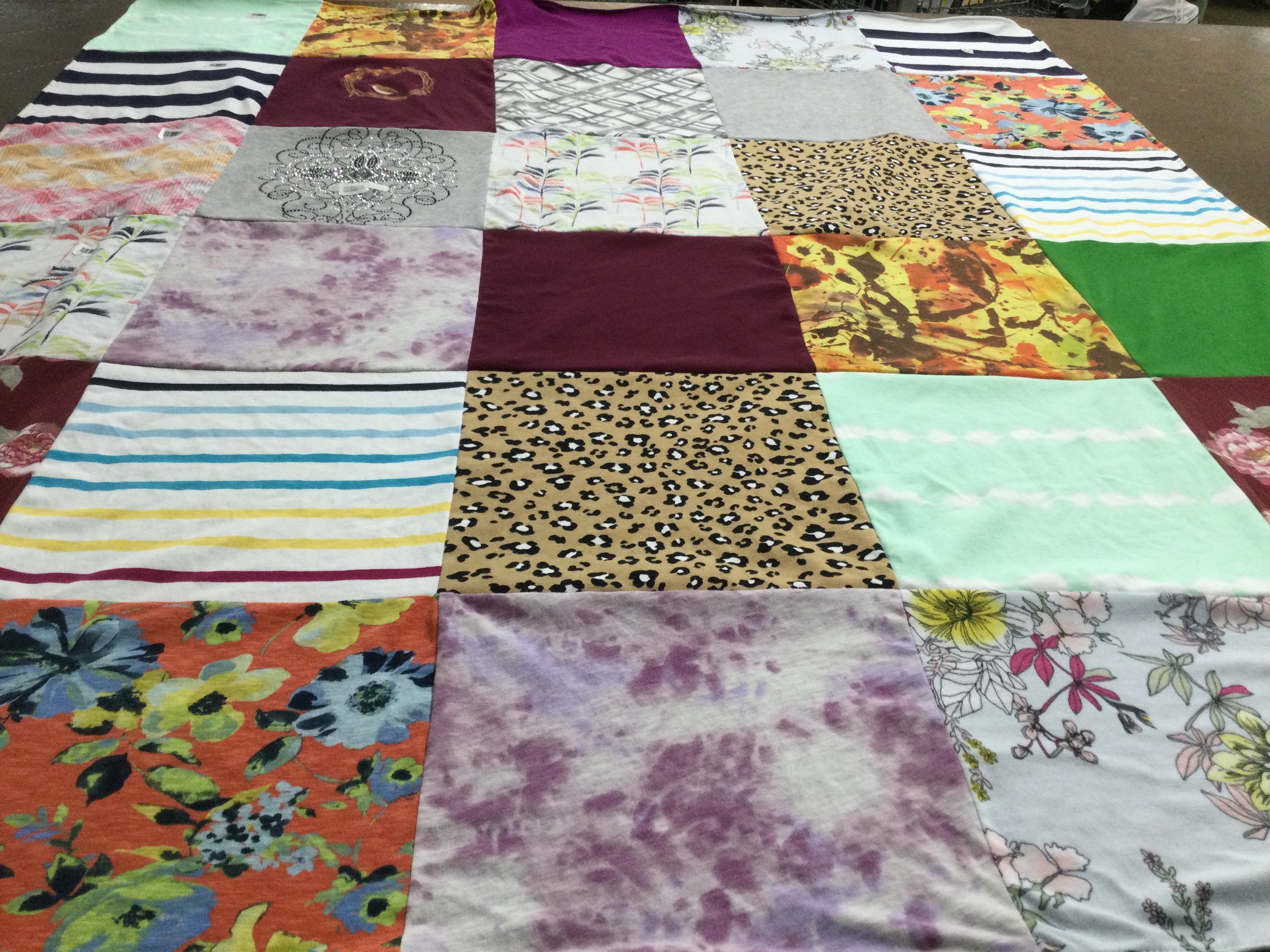 T-shirt quilt with fashion, textiles themes by Beth from GA