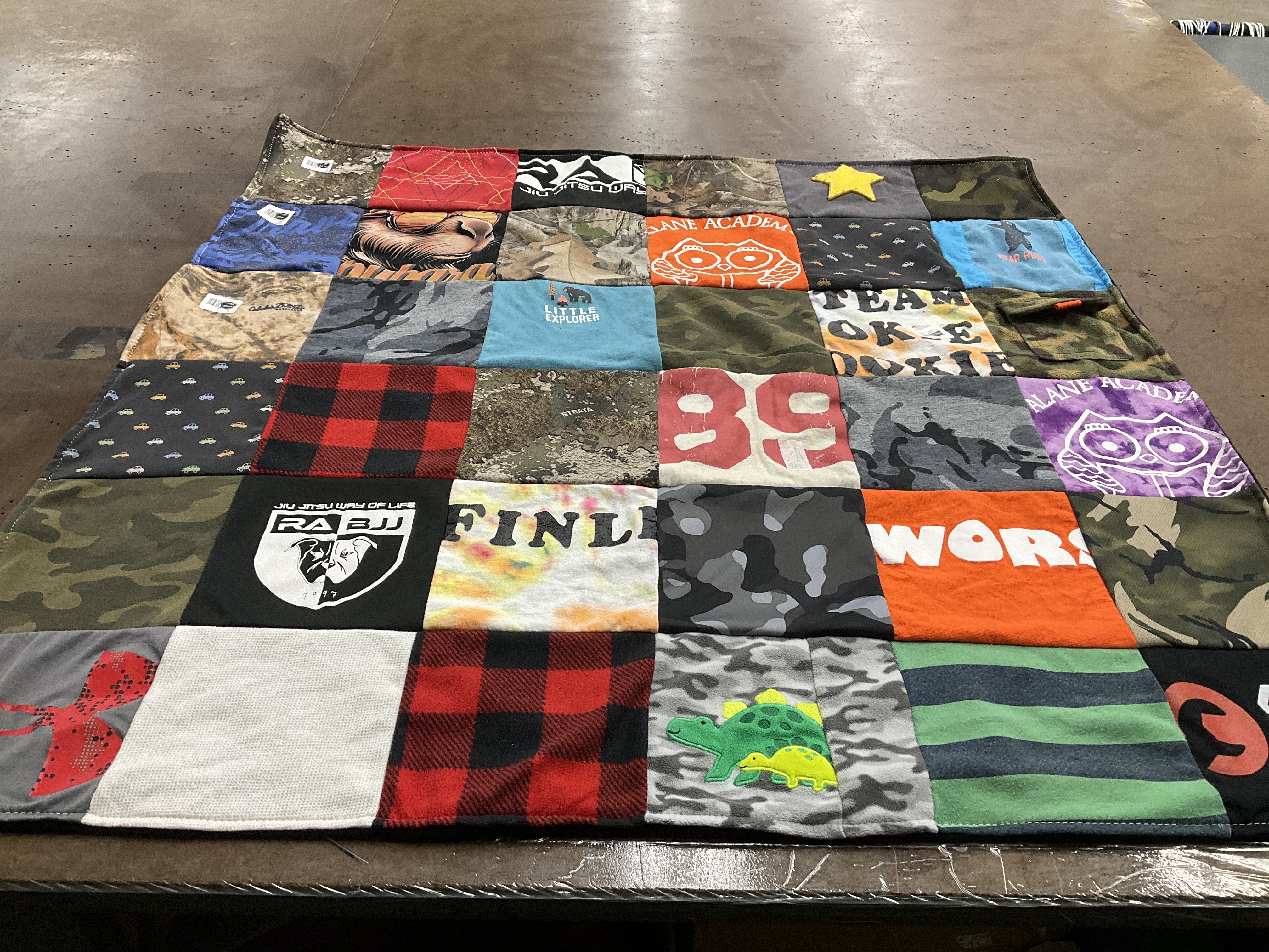 T-shirt quilt with jiu jitsu, outdoors themes by Brenda from FL