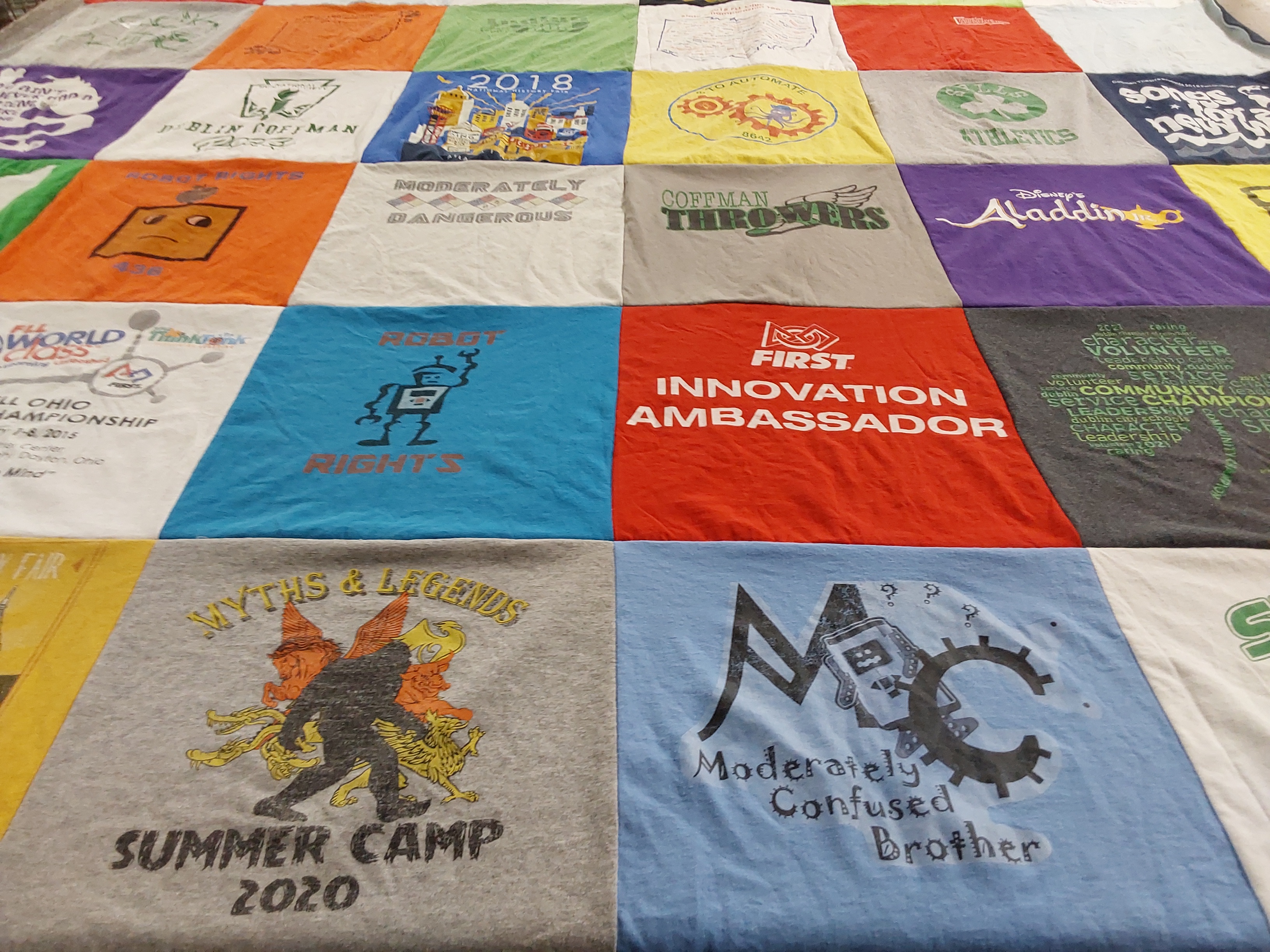 T-shirt quilt with robotics, camping themes by Jen from OH