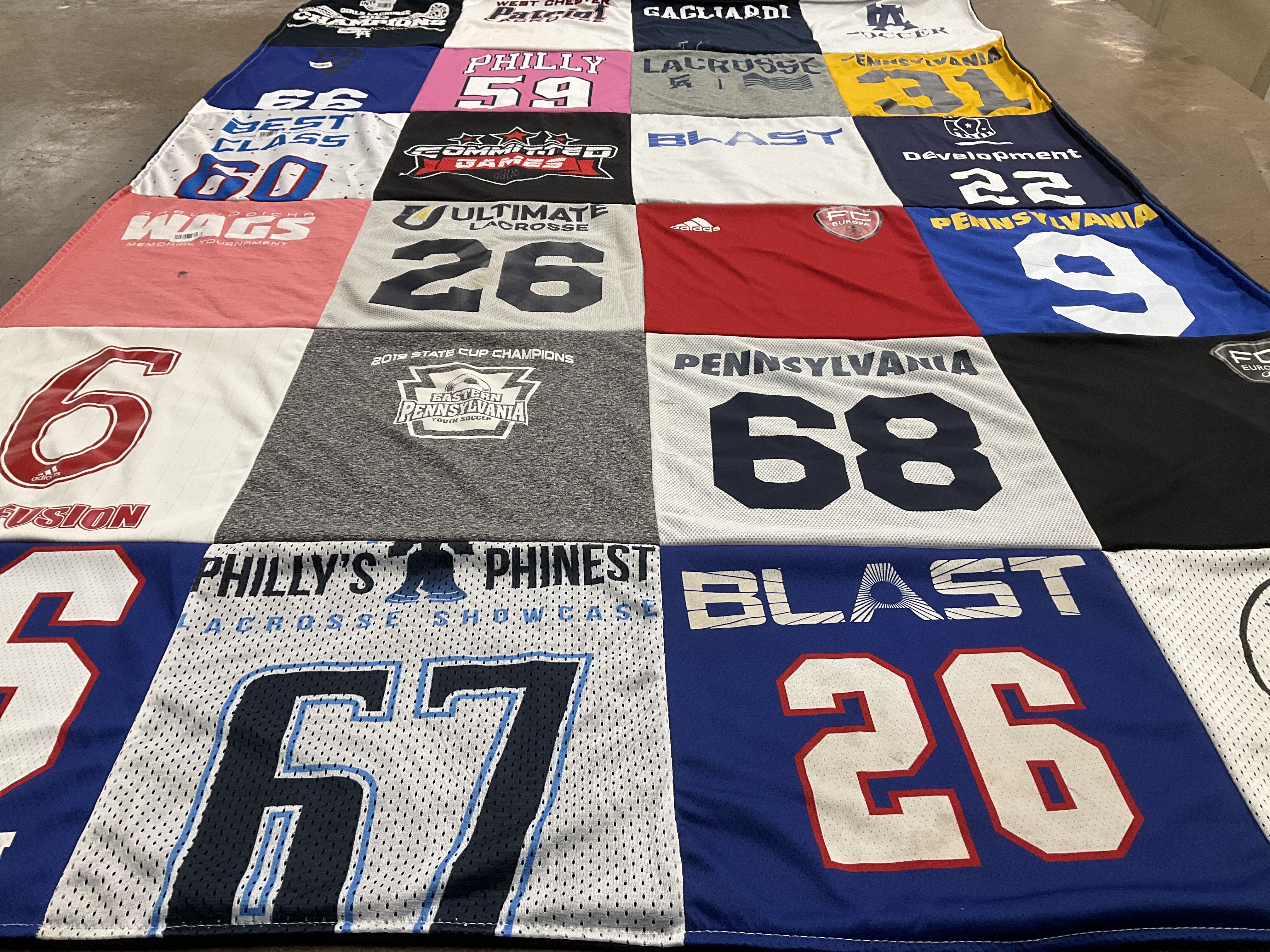 T-shirt quilt with sports, lacrosse themes by Sue from PA