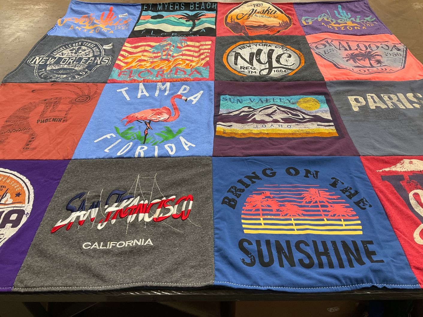 T-shirt quilt with travel, beaches themes by Merrill from TN