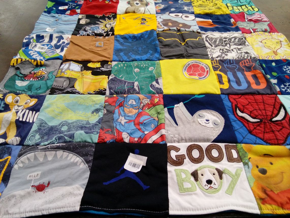 T-shirt quilt with superheroes, cartoons themes by Lisa from CO