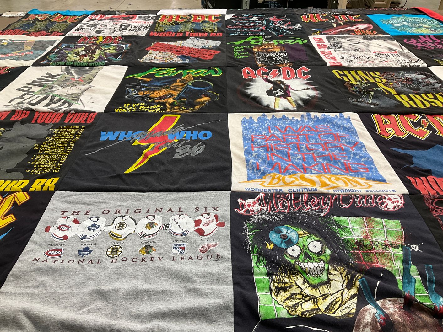 T-shirt quilt with rock music, hockey themes by Patricia from MA