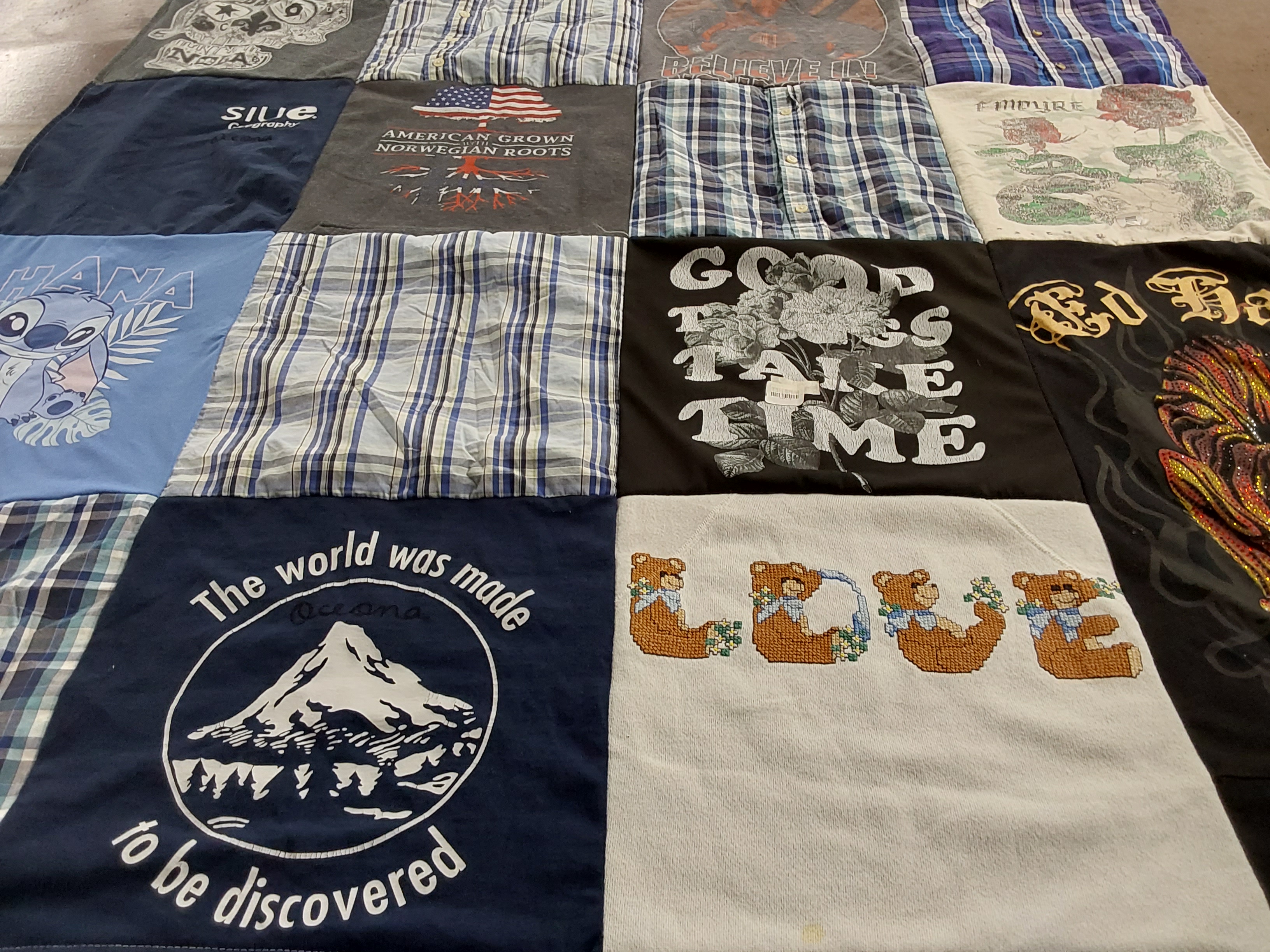 T-shirt quilt with travel, nature themes by Jenn from TX